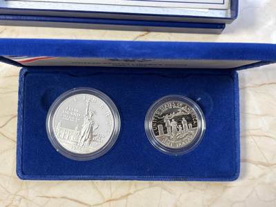 第183期拍卖 - 1986年美国双币套 自由女神纪念银币和铜镍币（1美元+半美元） 26.73克900银 盒证全