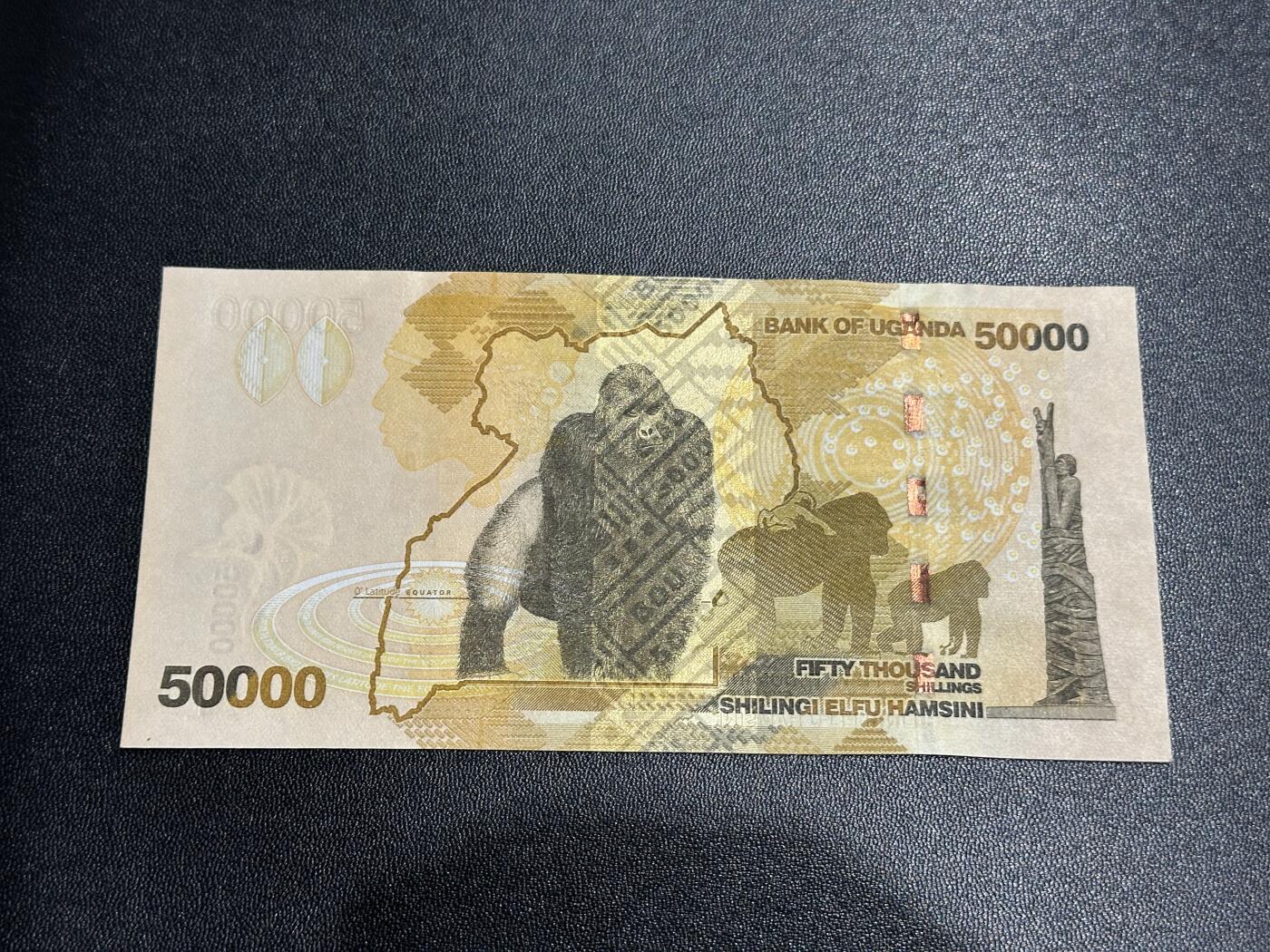 《外钞收藏家》第五百九十期（欧洲强钞、港币、硬通货及丰富裸币大拍场）（本平台长期征集拍品、欢迎藏友们联系合作） 2021年乌干达5万先令 全新UNC 大猩猩