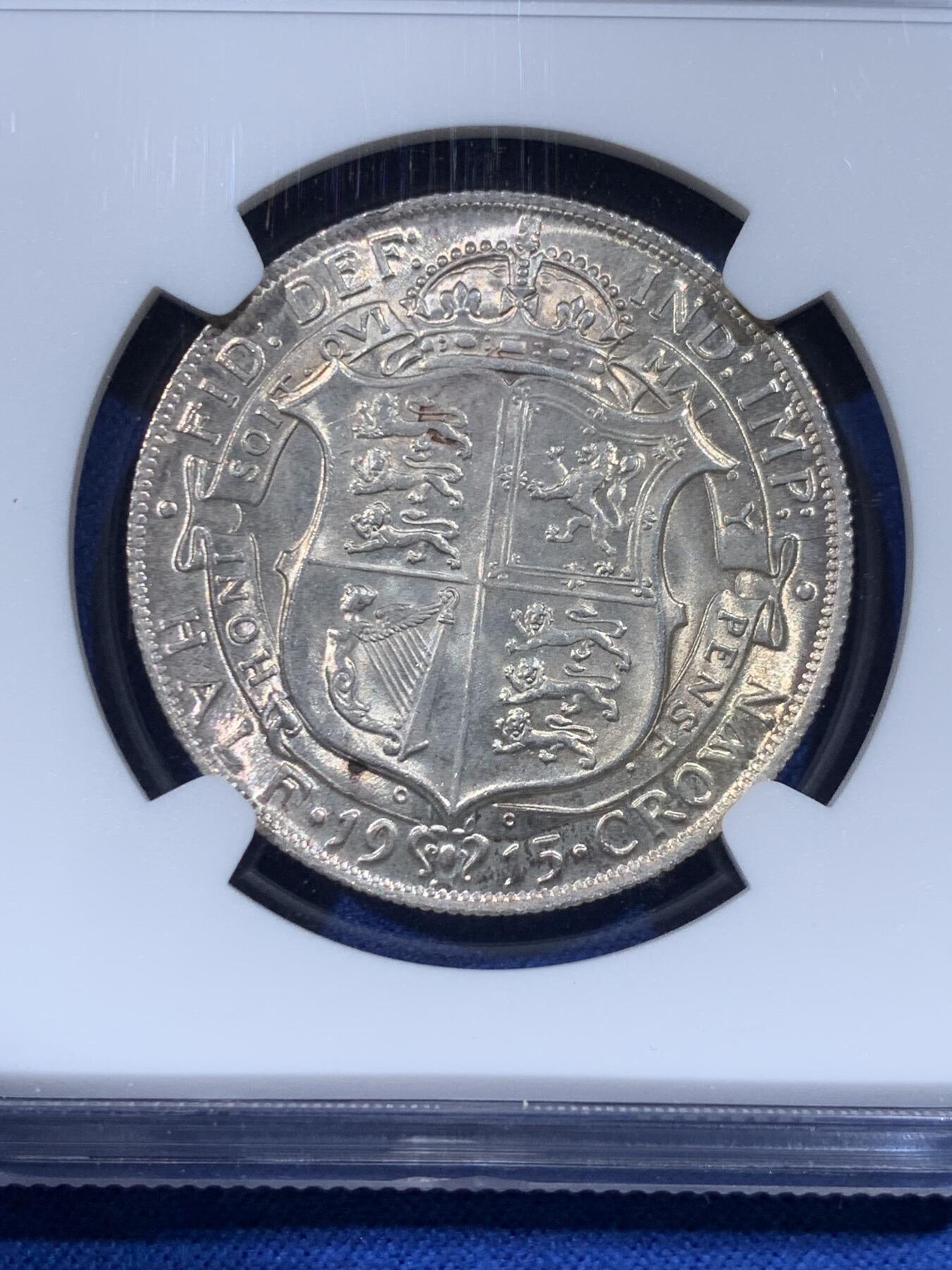 《竞宝斋》第443场 周日，周一，2场连拍 （全场包邮） NGC MS65 英国1915乔治五世流通半克朗银币，转光四溢，银色清爽，收藏级品质。流通版能到65分难度大，书价365美刀，是64分的近两倍。