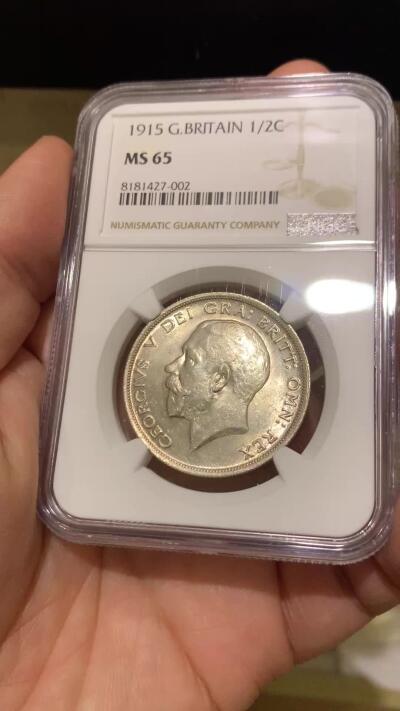 《竞宝斋》第443场 周日，周一，2场连拍 （全场包邮） NGC MS65 英国1915乔治五世流通半克朗银币，转光四溢，银色清爽，收藏级品质。流通版能到65分难度大，书价365美刀，是64分的近两倍。