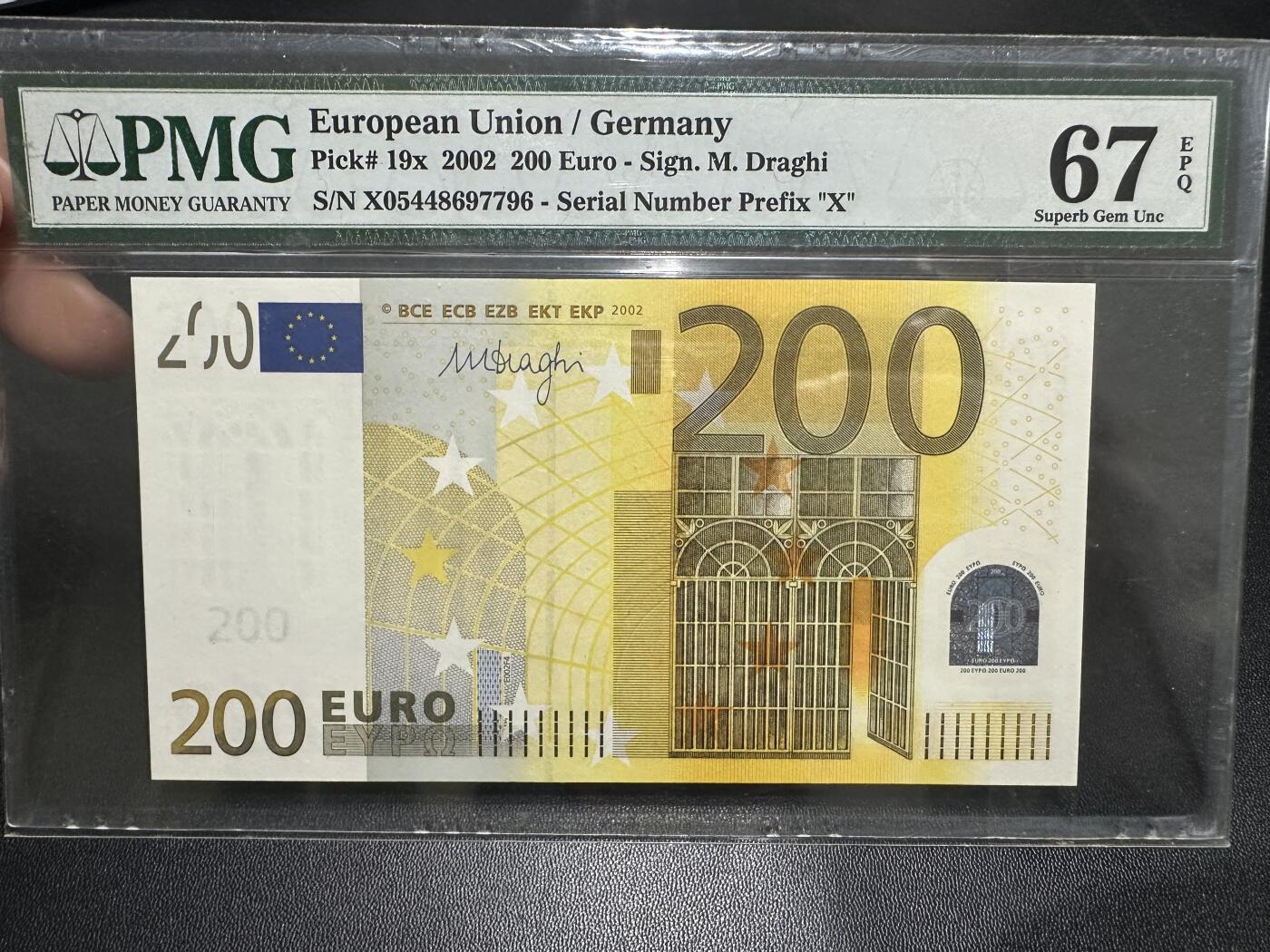《外钞收藏家》第五百九十期（欧洲强钞、港币、硬通货及丰富裸币大拍场）（本平台长期征集拍品、欢迎藏友们联系合作） 2002年三签200欧元 PMG67 德国版