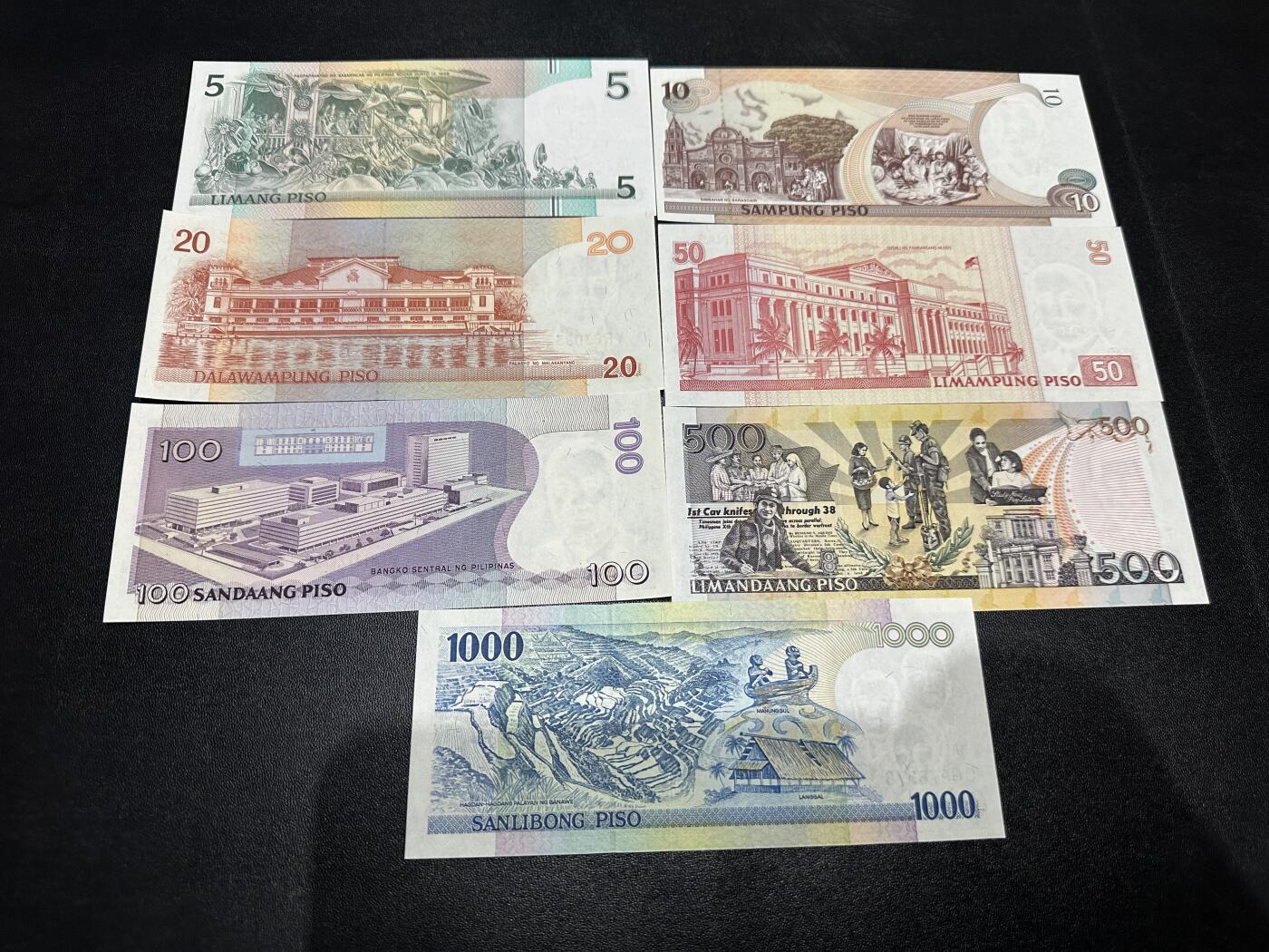 《外钞收藏家》第五百九十期（欧洲强钞、港币、硬通货及丰富裸币大拍场）（本平台长期征集拍品、欢迎藏友们联系合作） 菲律宾5-1000比索 7张一起 全新UNC