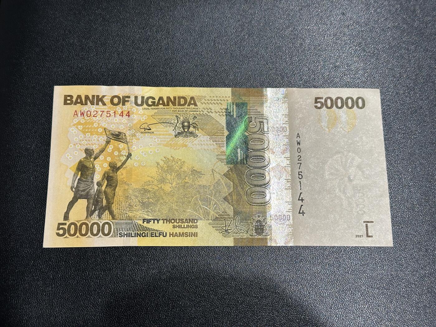 《外钞收藏家》第五百九十期（欧洲强钞、港币、硬通货及丰富裸币大拍场）（本平台长期征集拍品、欢迎藏友们联系合作） 2021年乌干达5万先令 全新UNC 大猩猩