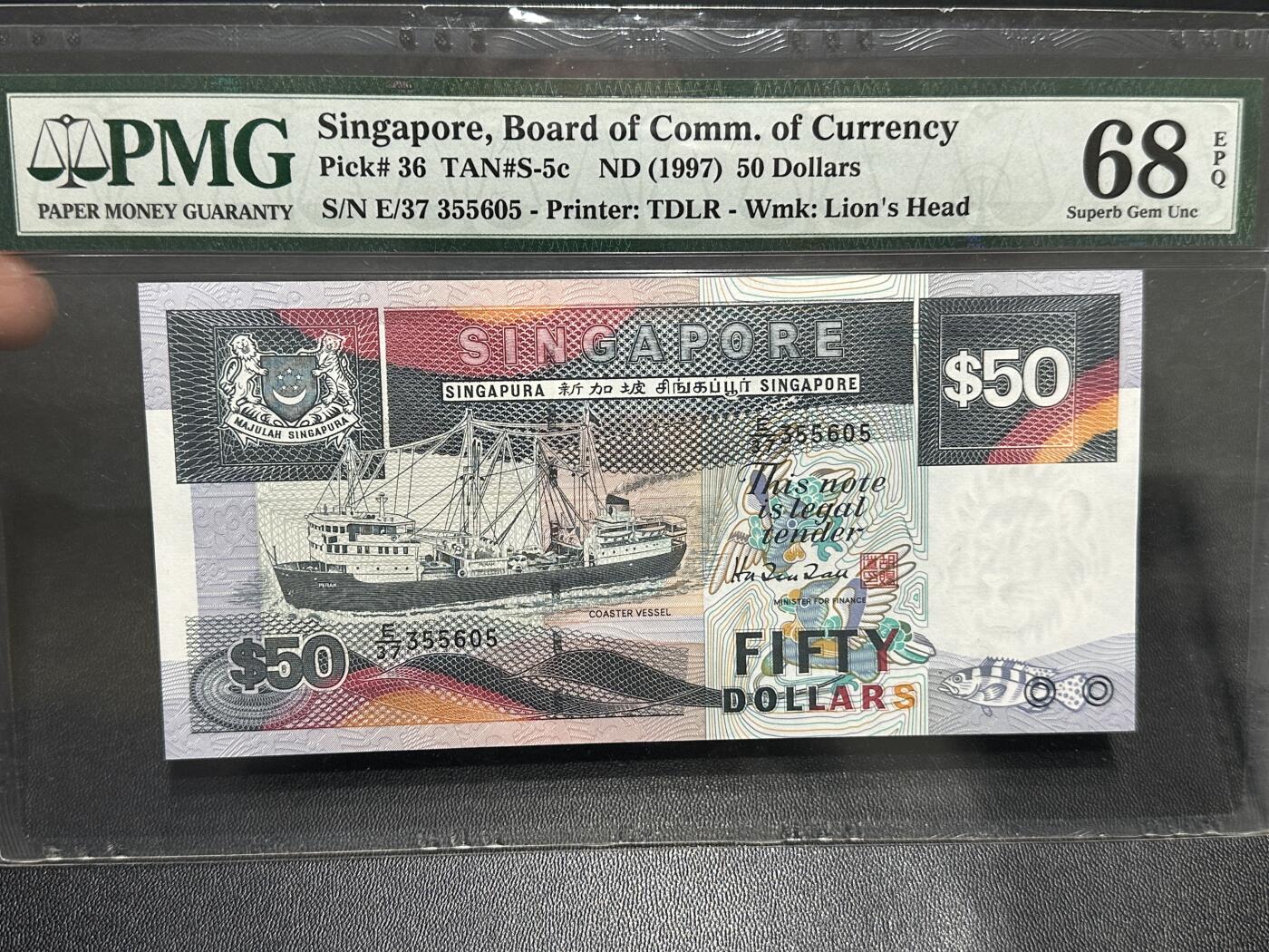 《外钞收藏家》第五百九十期（欧洲强钞、港币、硬通货及丰富裸币大拍场）（本平台长期征集拍品、欢迎藏友们联系合作） 1997年新加坡船版100元 PMG68 高分 靓号