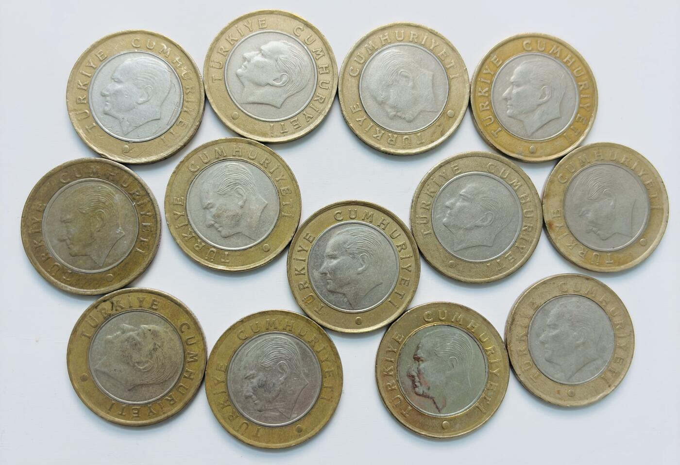 文馨钱币收藏第 284 场，【 长期接收代拍品】老藏家拍品南朝鲜李承晚时期货币，泰国大型纪念币，土耳其各时期及各国套币场 土耳其 1 里拉双色纪念币 13 枚