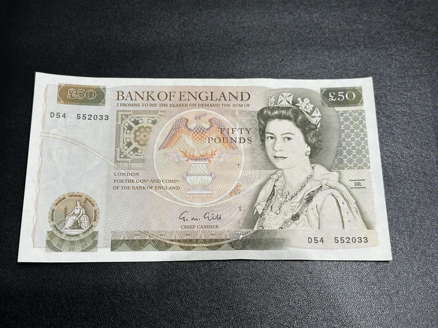 《外钞收藏家》第五百九十期（欧洲强钞、港币、硬通货及丰富裸币大拍场）（本平台长期征集拍品、欢迎藏友们联系合作） 英国D序列50镑 UNC-
