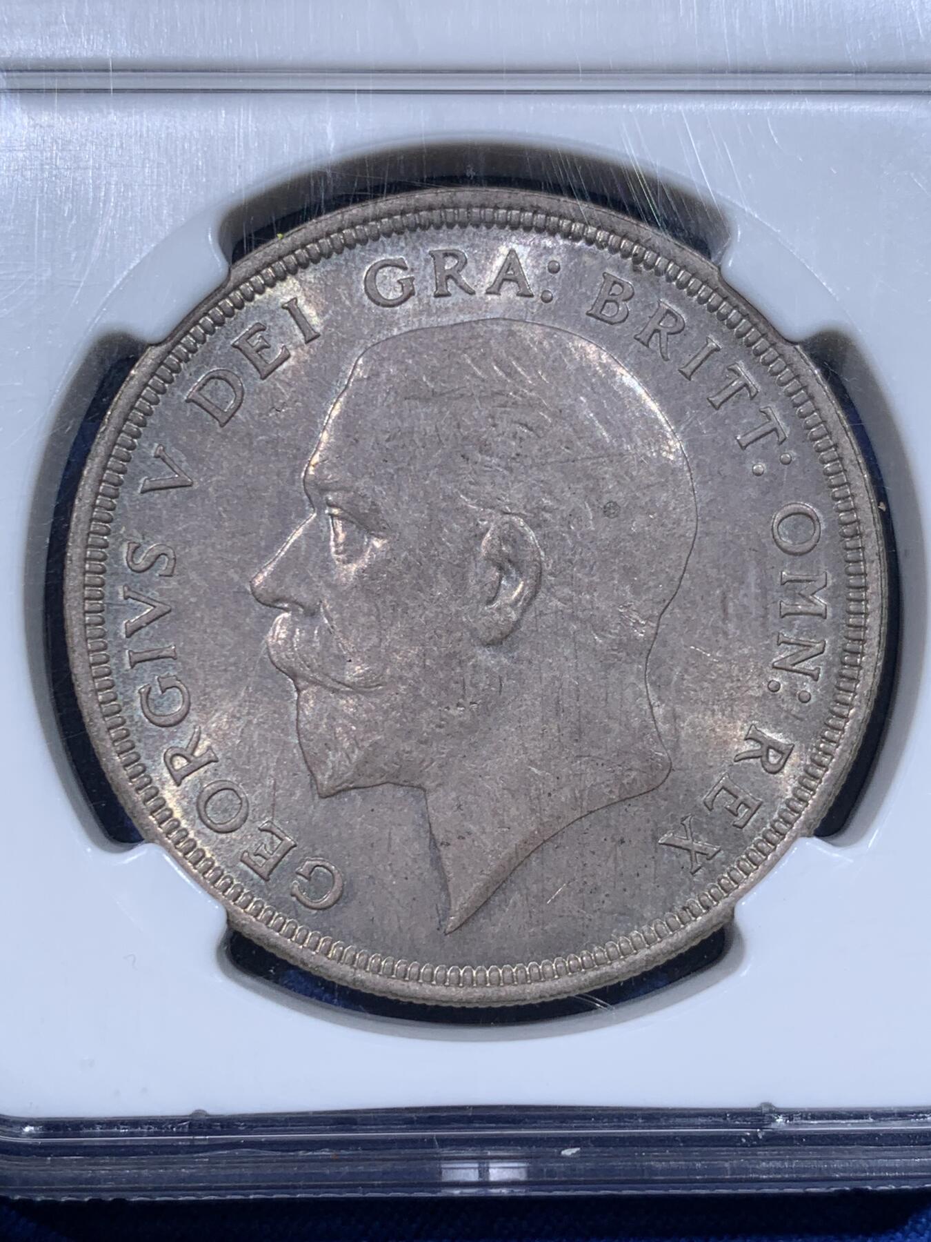 《竞宝斋》第443场 周日，周一，2场连拍 （全场包邮） NGC MS64 英国 1928年乔治五世花冠克朗银币，少见版本，发行量9034枚，两面非常好看的紫灰色包浆，花冠少有这样的醇熟包浆