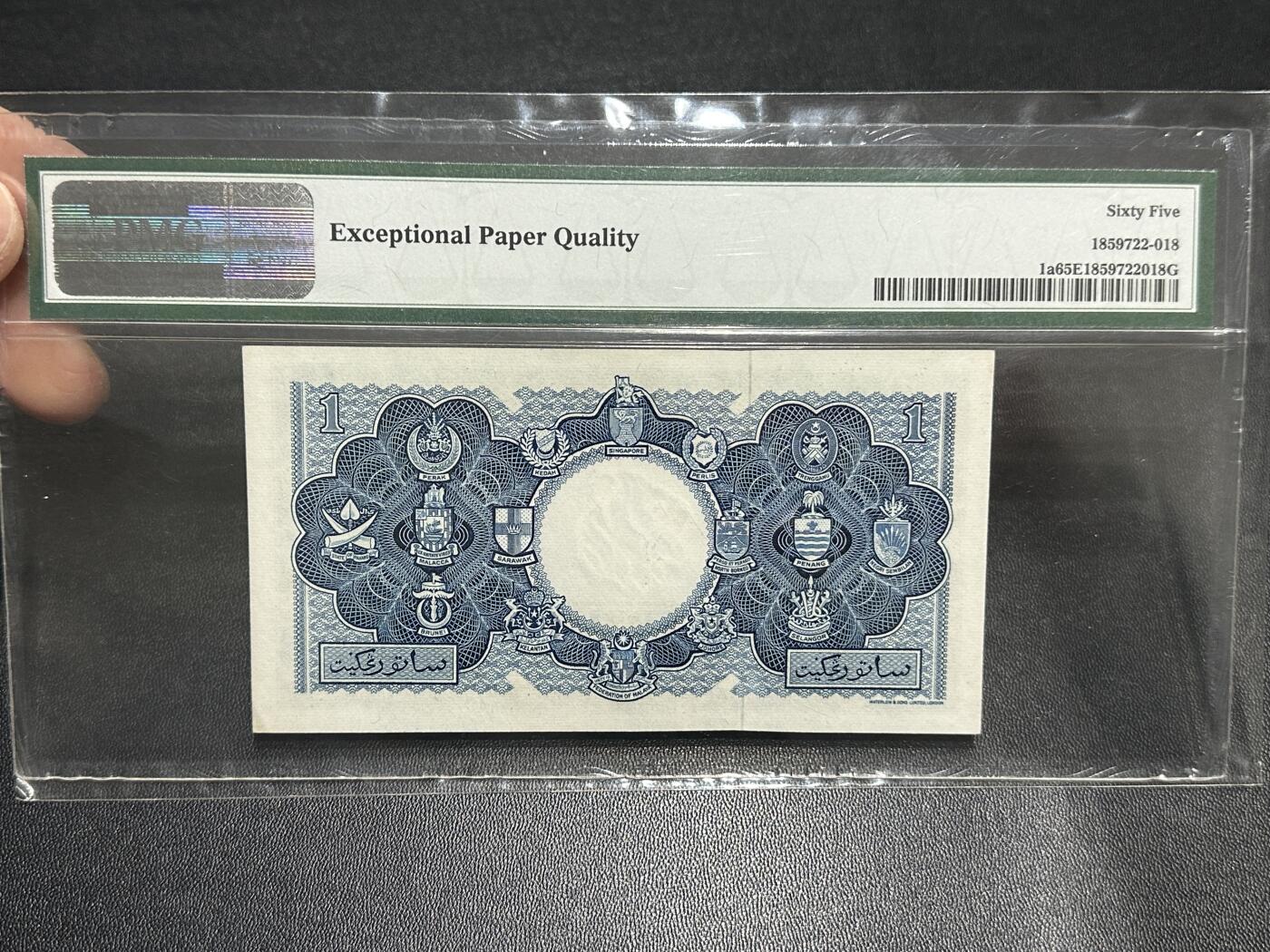 《外钞收藏家》第五百九十期（欧洲强钞、港币、硬通货及丰富裸币大拍场）（本平台长期征集拍品、欢迎藏友们联系合作） 1953年英属马来亚及婆罗洲1元 PMG65 W&S版