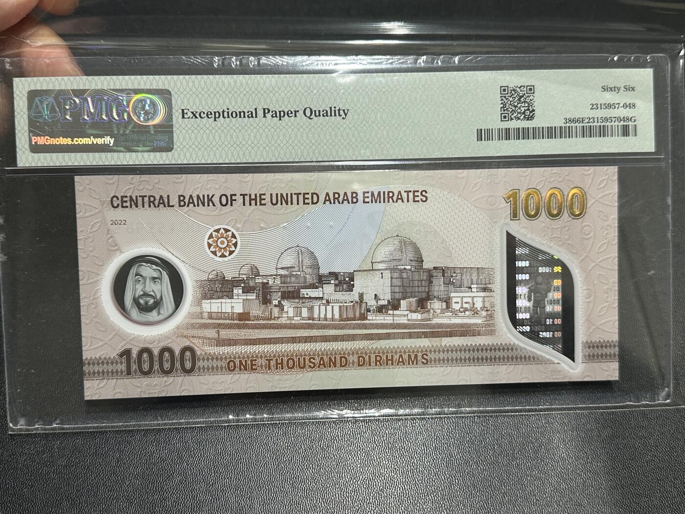 《外钞收藏家》第五百九十期（欧洲强钞、港币、硬通货及丰富裸币大拍场）（本平台长期征集拍品、欢迎藏友们联系合作） 2022年阿联酋1000迪拉姆 PMG66 无47靓号 尾852 /001首冠