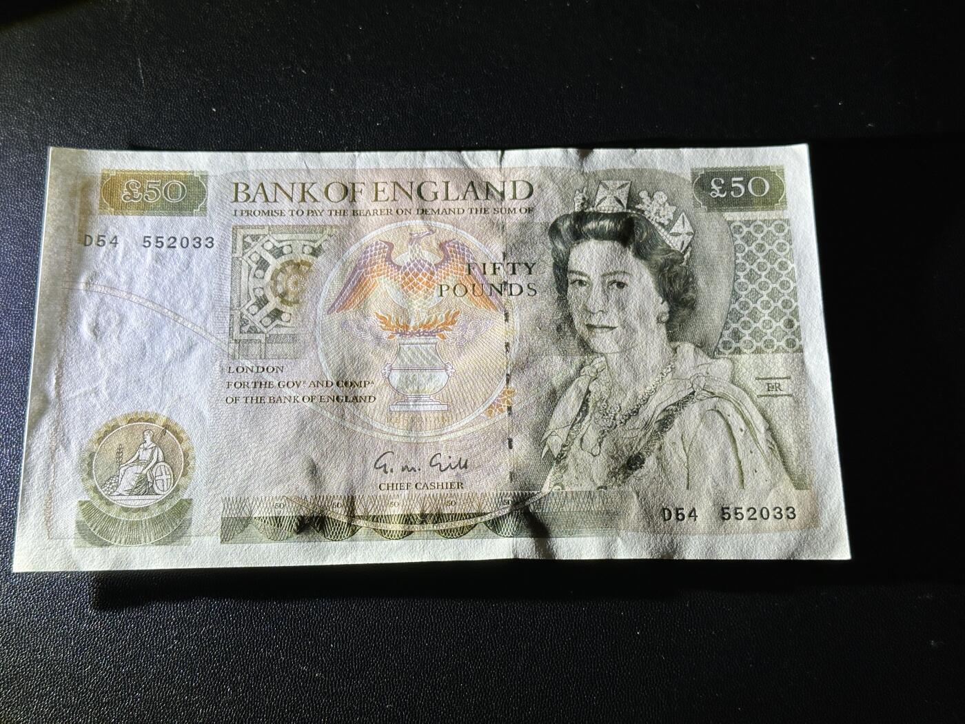 《外钞收藏家》第五百九十期（欧洲强钞、港币、硬通货及丰富裸币大拍场）（本平台长期征集拍品、欢迎藏友们联系合作） 英国D序列50镑 UNC-