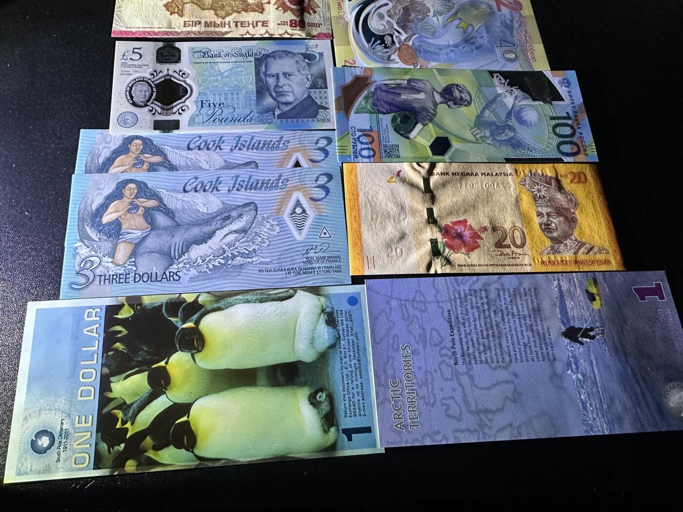 《外钞收藏家》第五百九十期（欧洲强钞、港币、硬通货及丰富裸币大拍场）（本平台长期征集拍品、欢迎藏友们联系合作） 哈萨克斯坦、苏格兰、英镑、俄罗斯、马来西亚、库克群岛等纪念钞和流通钞11张一起 全新UNC