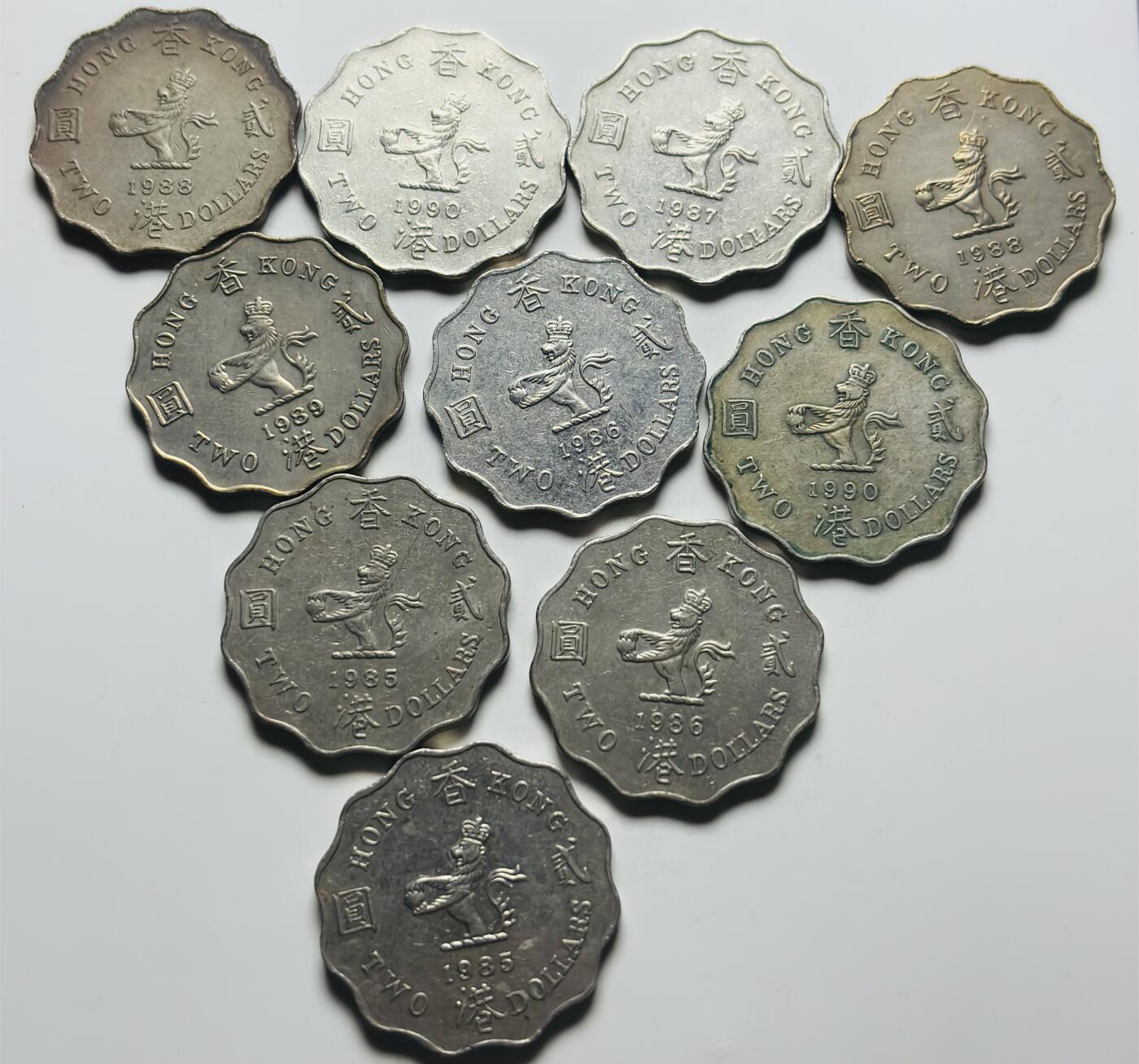 文馨钱币收藏第 284 场，【 长期接收代拍品】老藏家拍品南朝鲜李承晚时期货币，泰国大型纪念币，土耳其各时期及各国套币场 好品英属香港时期贰元 10 枚，含少年分 1987 年