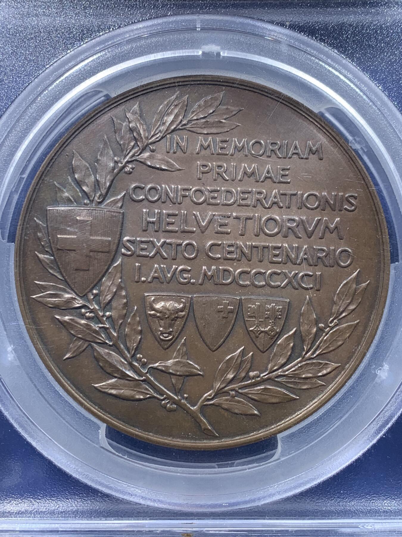 《竞宝斋》第443场 周日，周一，2场连拍 （全场包邮） PCGS SP63 亚军分 瑞士1891年联邦600周年飞天清凉女神大铜章，68mm大规格，151g，厚重压手。背生双翼的飞天女神在山间翱翔，手持火炬与橄榄枝，画面生动美好。收藏级大尺寸清凉章，更高仅1枚64，加厚盒。