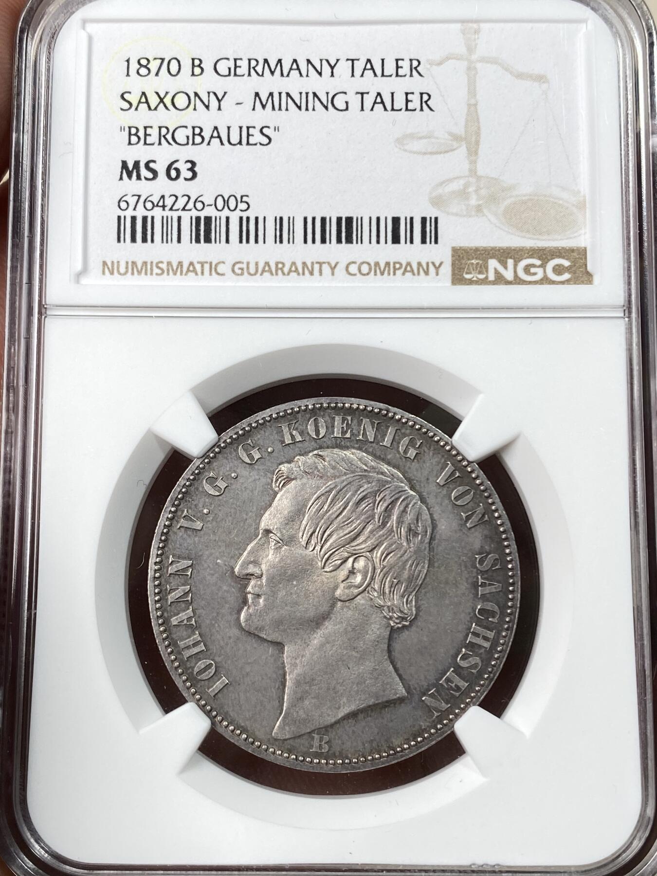 万国钱币拍卖第056期 NGC MS63 1870年德国萨克森流通矿业泰勒银币 双矿工护盾 淡玫瑰色五彩收藏品质