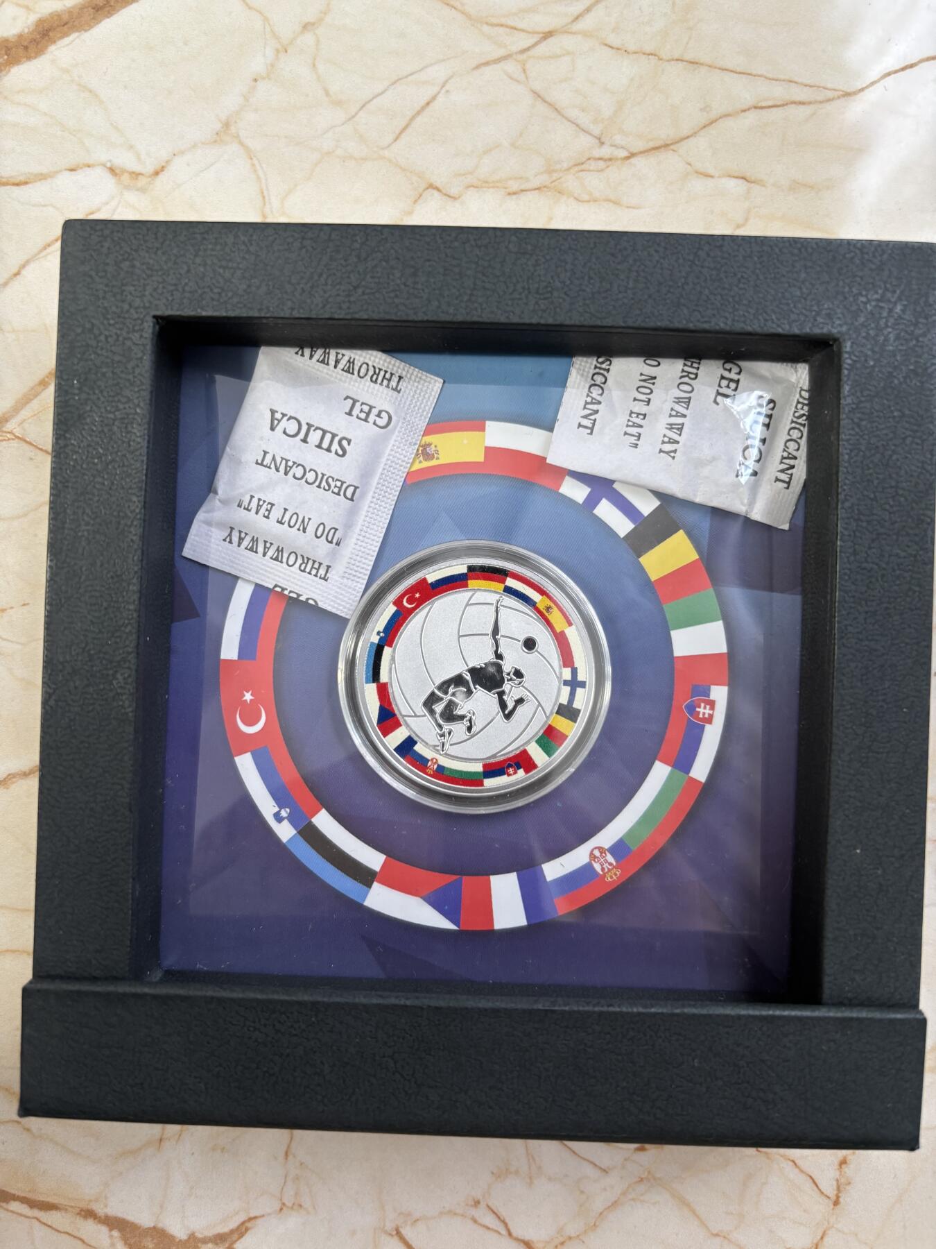 第184期拍卖  纽埃2017年体育运动项目排球彩色精制纪念银币,999银，发行500枚，17.5克