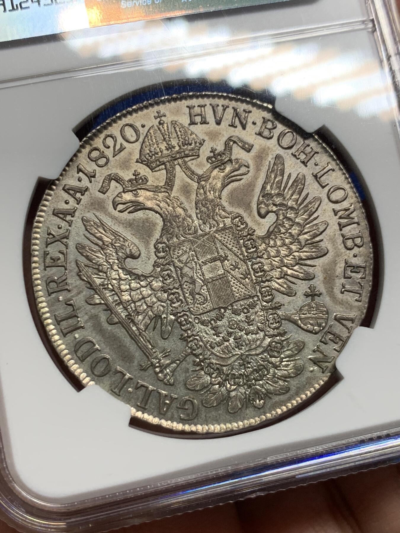 《竞宝斋》第443场 周日，周一，2场连拍 （全场包邮） NGC AU55 奥地利 1820年 奥地利的弗朗茨一世 泰勒银币 高点保存的不错 包浆更是让人难忘