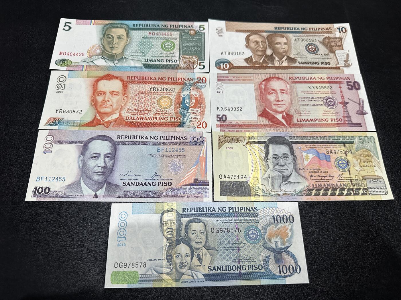 《外钞收藏家》第五百九十期（欧洲强钞、港币、硬通货及丰富裸币大拍场）（本平台长期征集拍品、欢迎藏友们联系合作） 菲律宾5-1000比索 7张一起 全新UNC