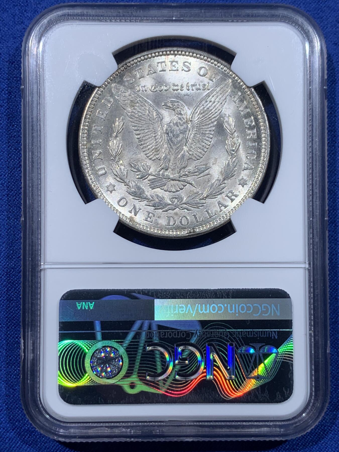 《竞宝斋》第443场 周日，周一，2场连拍 （全场包邮） NGC MS63 美国1921年摩根银币 卷首币，女神面均匀酱环彩，这种酱彩在国币上常见，在摩根上罕见。1921年关门年份摩根，彩币极少，这样均匀环彩更少。