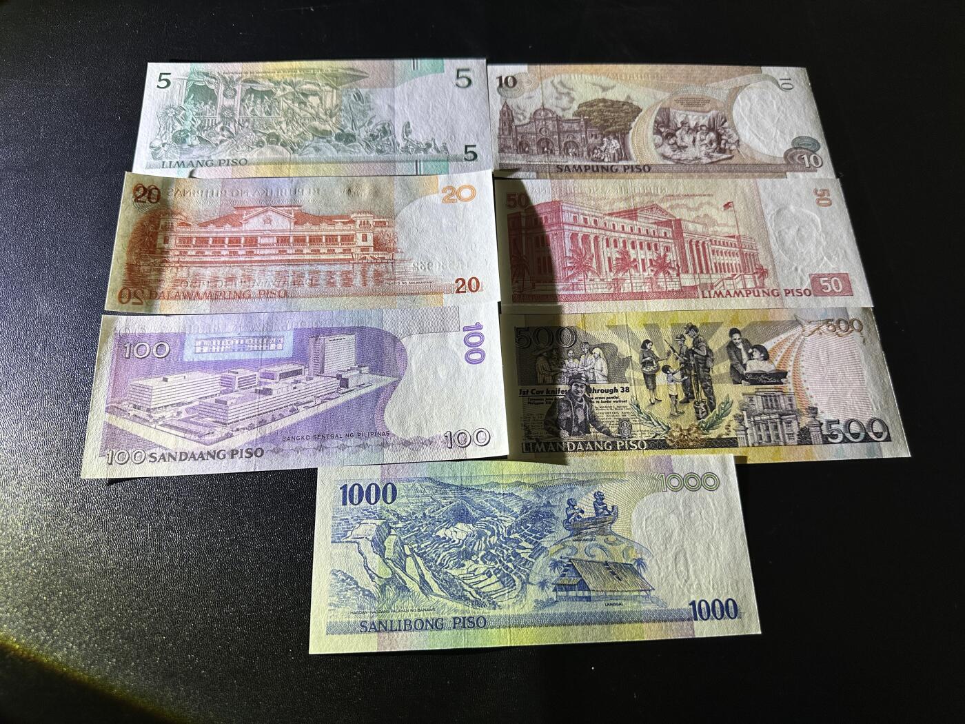 《外钞收藏家》第五百九十期（欧洲强钞、港币、硬通货及丰富裸币大拍场）（本平台长期征集拍品、欢迎藏友们联系合作） 菲律宾5-1000比索 7张一起 全新UNC