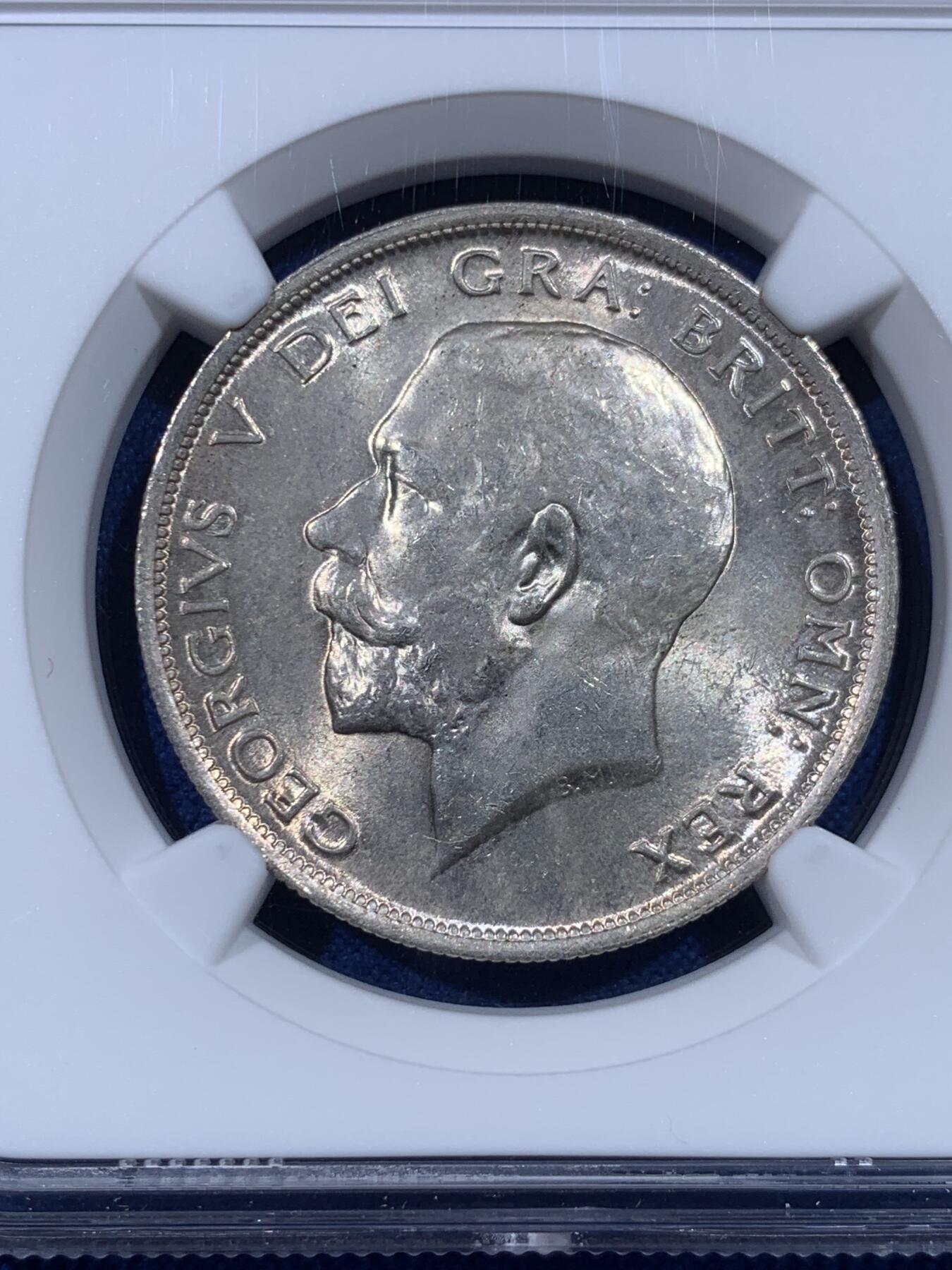 《竞宝斋》第443场 周日，周一，2场连拍 （全场包邮） NGC MS65 英国1915乔治五世流通半克朗银币，转光四溢，银色清爽，收藏级品质。流通版能到65分难度大，书价365美刀，是64分的近两倍。