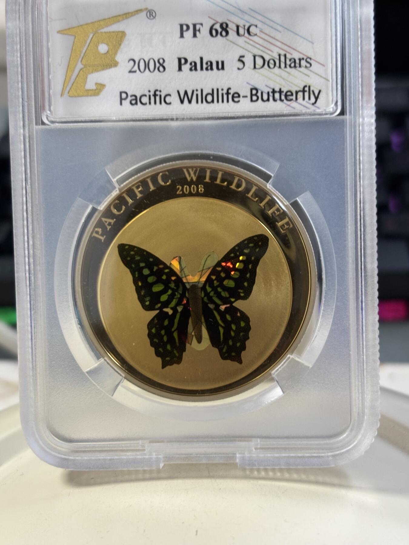 第184期拍卖 获奖帕劳2008年蝴蝶动物系列绿蝴蝶棱镜幻彩银币TQC-PF68，世界最美25种钱币之一，925银，25克，发行2500枚