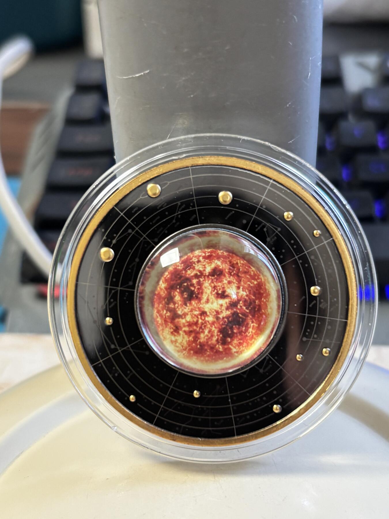 第184期拍卖 喀麦隆2021年太阳系系列太阳钌化镀金彩印纪念银币，金属:999银钌化镀金，重量:17.5克，直径:50毫米，发行：555枚