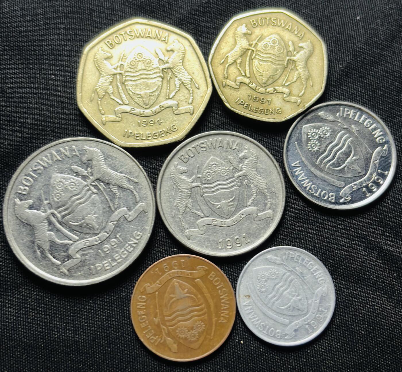 文馨钱币收藏第 284 场，【 长期接收代拍品】老藏家拍品南朝鲜李承晚时期货币，泰国大型纪念币，土耳其各时期及各国套币场 好品博茨瓦纳动物币 7 枚套