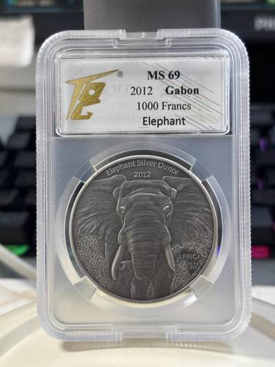 第184期拍卖 - 加蓬2012年非洲野生动物系列大象1盎司仿古银币TQG-MS69.999银，发行2000枚