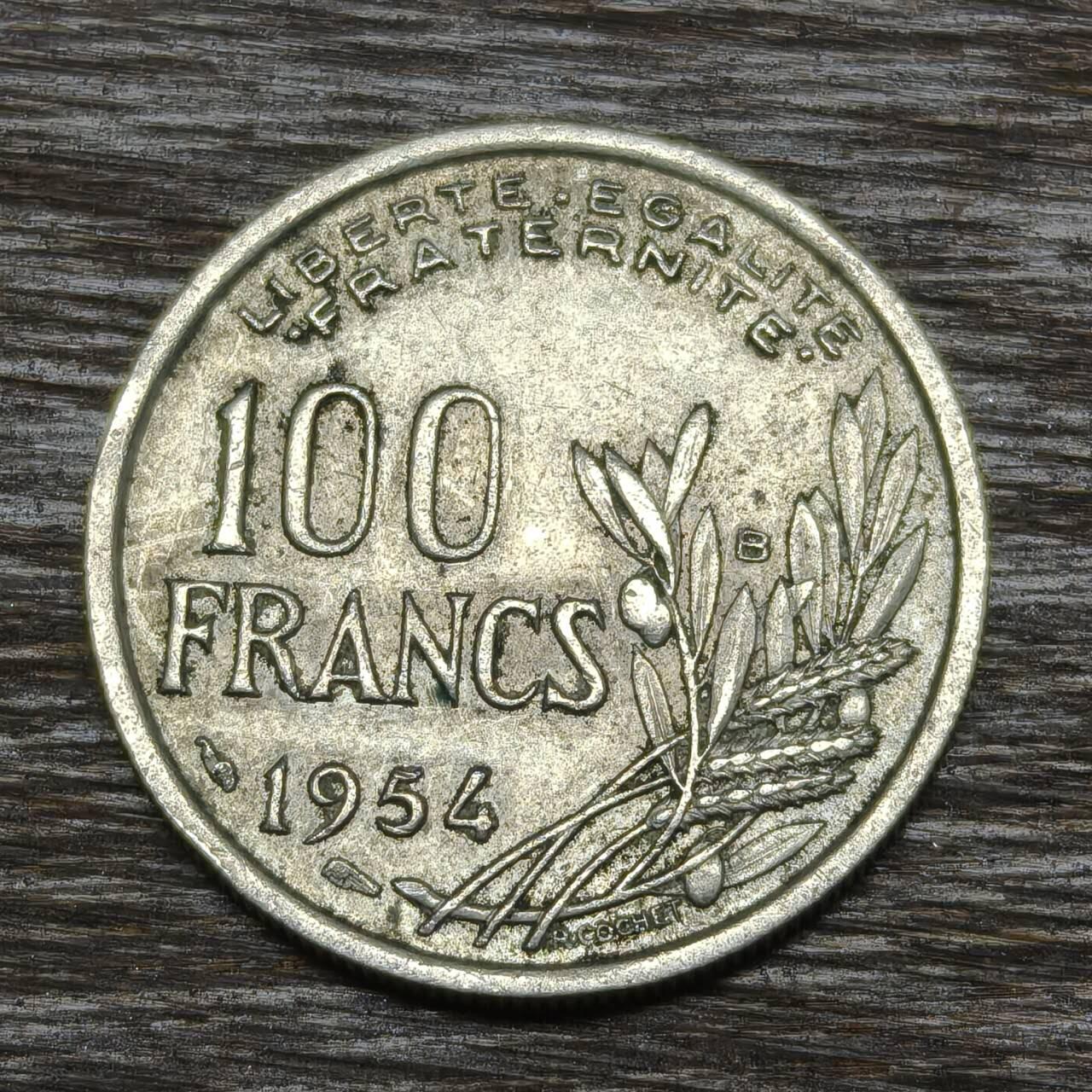 【铜匠收藏】★第134场★散币场，无佣金，30包邮。不满30元，支付5元运费。《接受代拍 代送NGC评级》 法国 1954年 100法郎 铜镍币 火炬女神