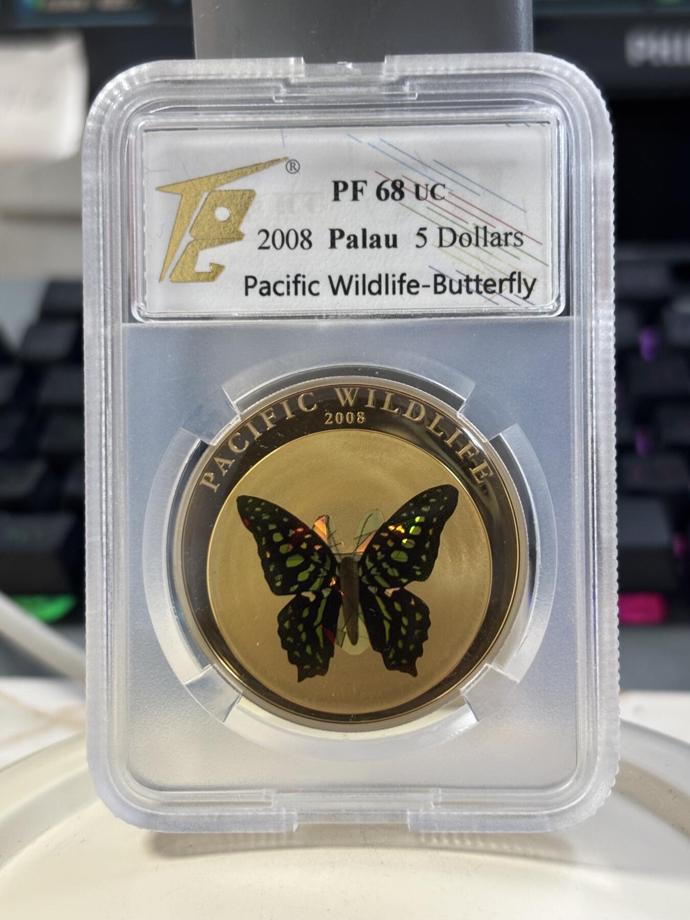 第184期拍卖 获奖帕劳2008年蝴蝶动物系列绿蝴蝶棱镜幻彩银币TQC-PF68，世界最美25种钱币之一，925银，25克，发行2500枚