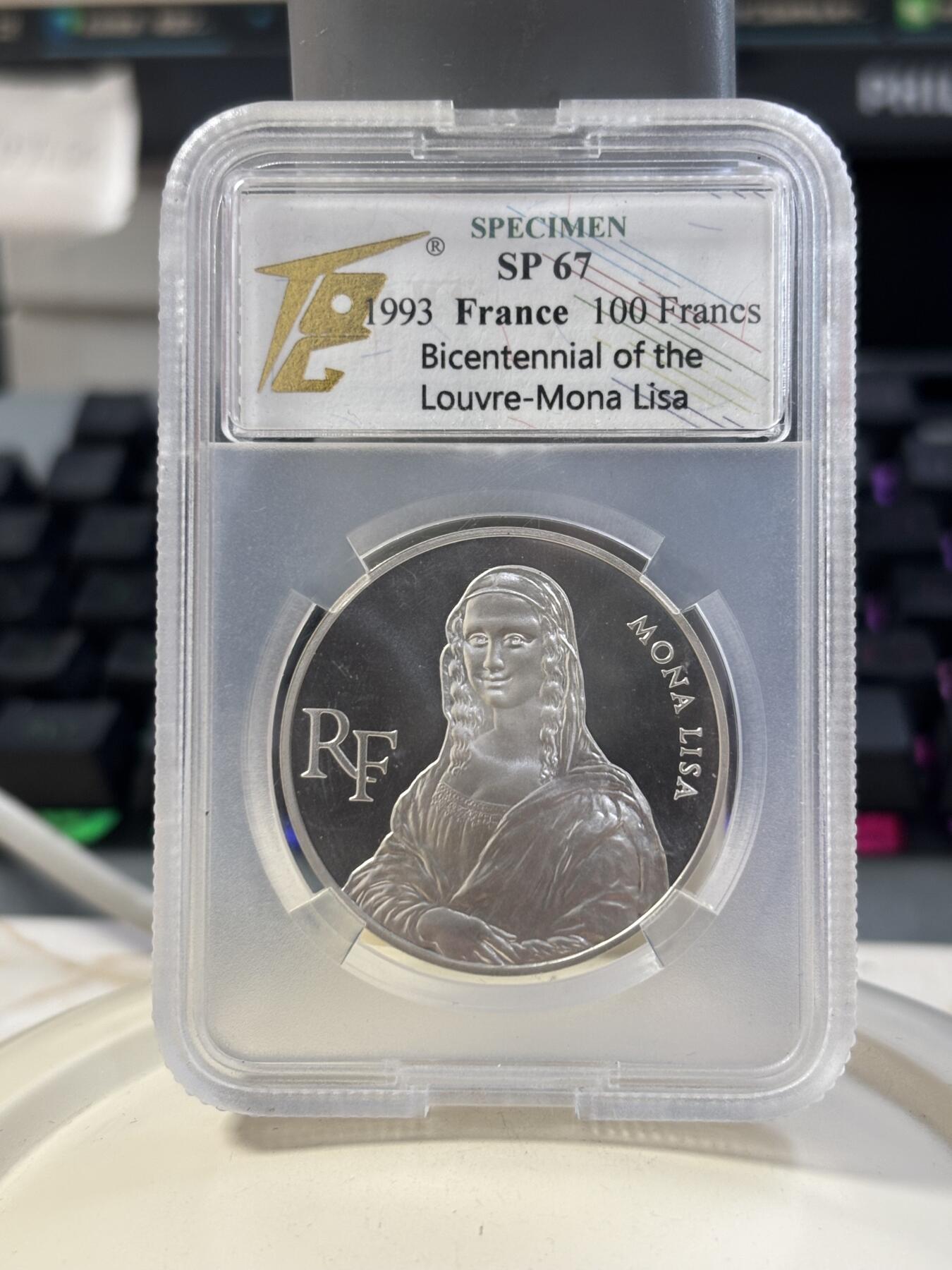 第184期拍卖 法国1993年卢浮宫馆藏系列蒙娜丽莎银样币TQG-SP67,900银，22.2克，发行1850枚