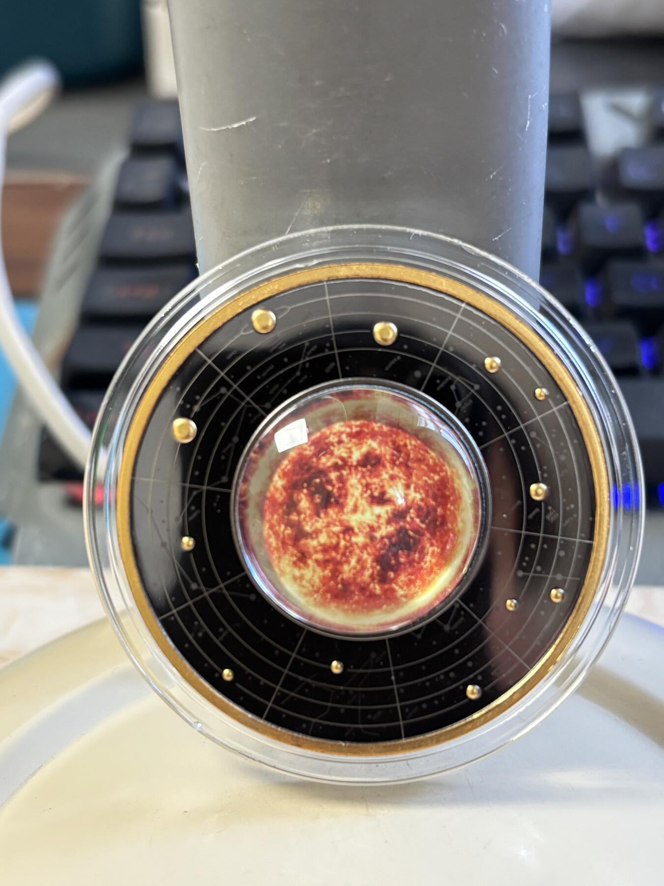 第184期拍卖 喀麦隆2021年太阳系系列太阳钌化镀金彩印纪念银币，金属:999银钌化镀金，重量:17.5克，直径:50毫米，发行：555枚