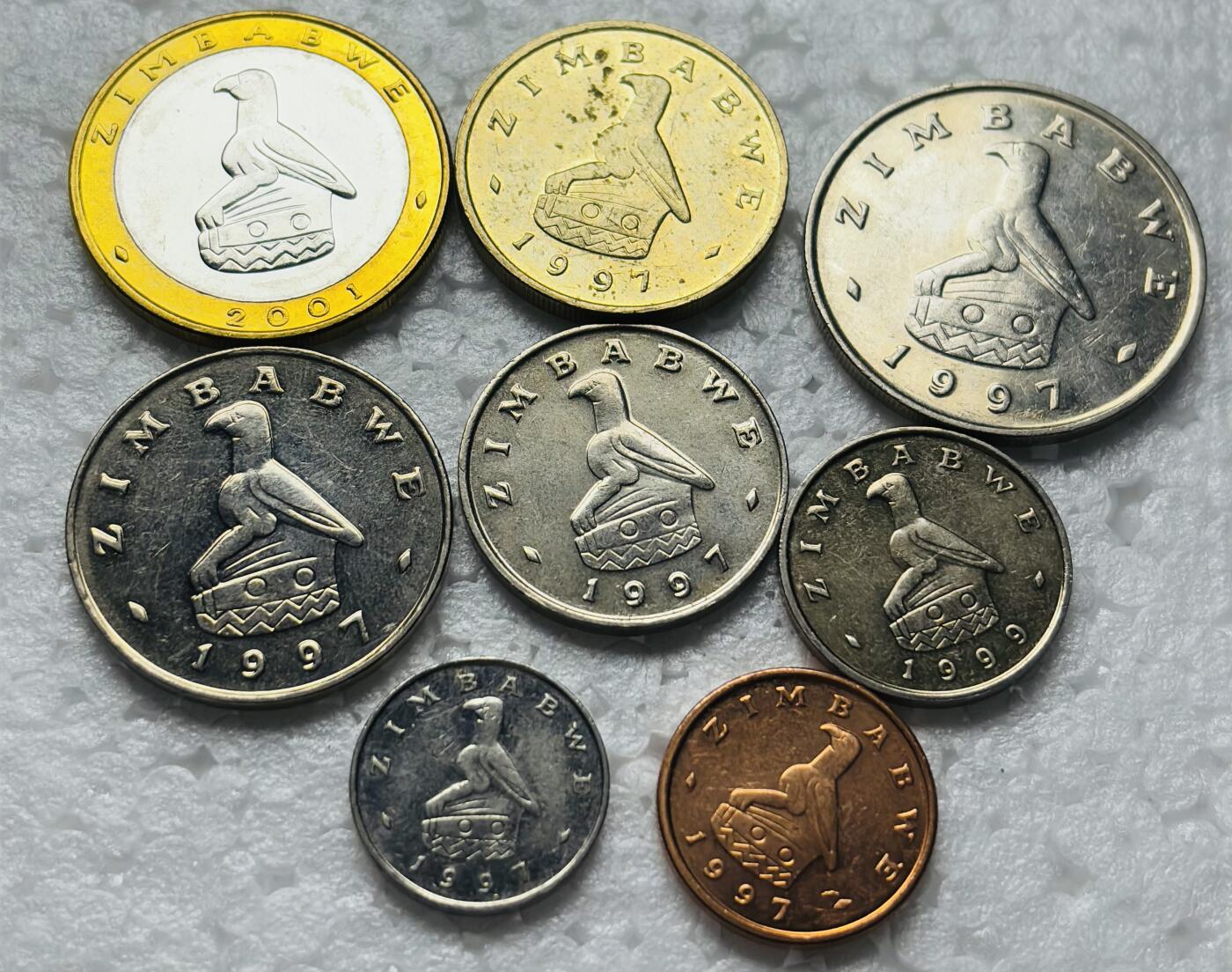 文馨钱币收藏第 284 场，【 长期接收代拍品】老藏家拍品南朝鲜李承晚时期货币，泰国大型纪念币，土耳其各时期及各国套币场 全国津巴布韦 8 枚套