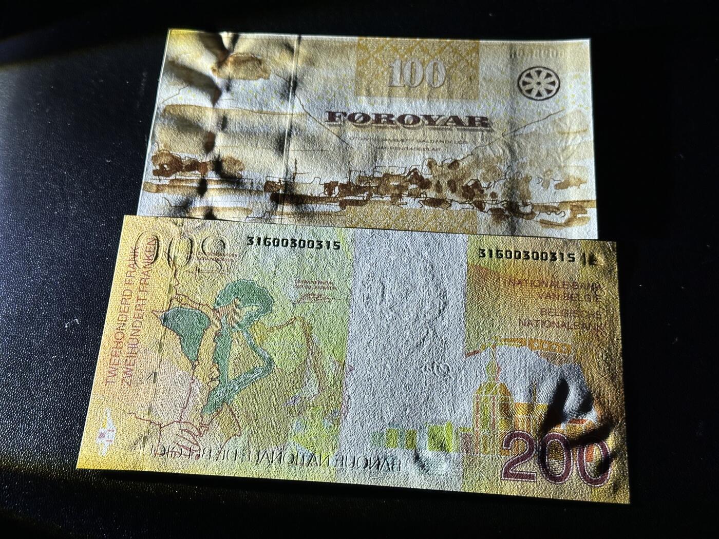 《外钞收藏家》第五百九十期（欧洲强钞、港币、硬通货及丰富裸币大拍场）（本平台长期征集拍品、欢迎藏友们联系合作） 法罗群岛100克朗+比利时末版200法郎 2张一起 全新UNC 都是无47靓号