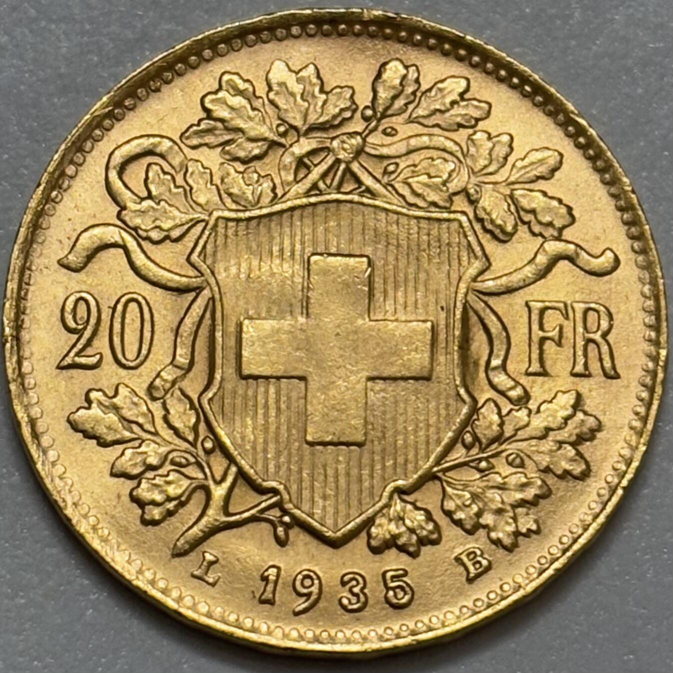 文馨钱币收藏第 283 场，【大雪鉴珍，寒英缀金】金银纪念币精品场，诚邀您的参与【长期接代拍品】 原光 1935 年瑞士雪山女神 20 法郎金币，重 6.4 克金 底板丝滑无比，金光闪闪，第二版关门版 B 厂，品相实属不易的投资收藏品