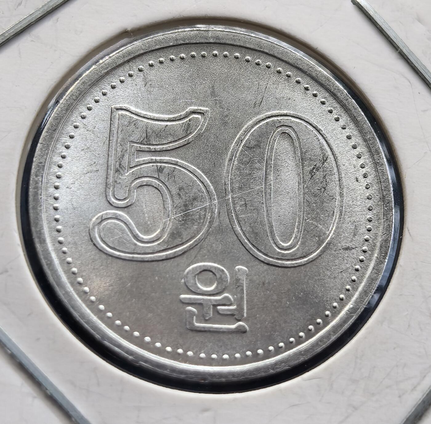 外国优质老铜币银币，周六九点倒数截拍，满百包邮，可寄存半年，喜欢朋友微信扫描二维码可直接参拍 朝鲜2005年50元