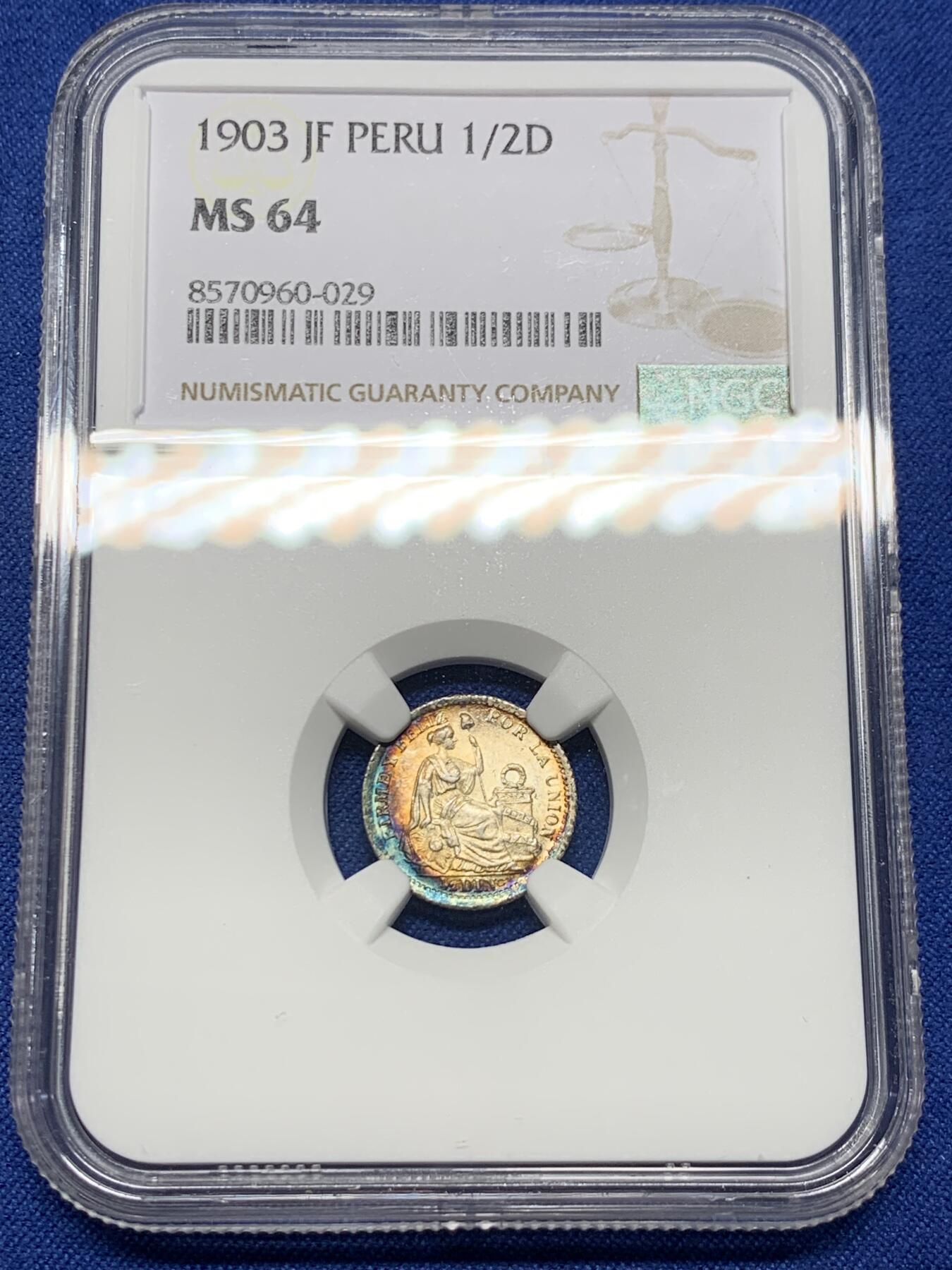 《竞宝斋》第444场 周日，周一，2场连拍 （全场包邮） NGC MS64 秘鲁1903年1/2蒂娜尔银币，双面带有月牙蓝彩包浆，十分亮眼的一枚，早期年份少见