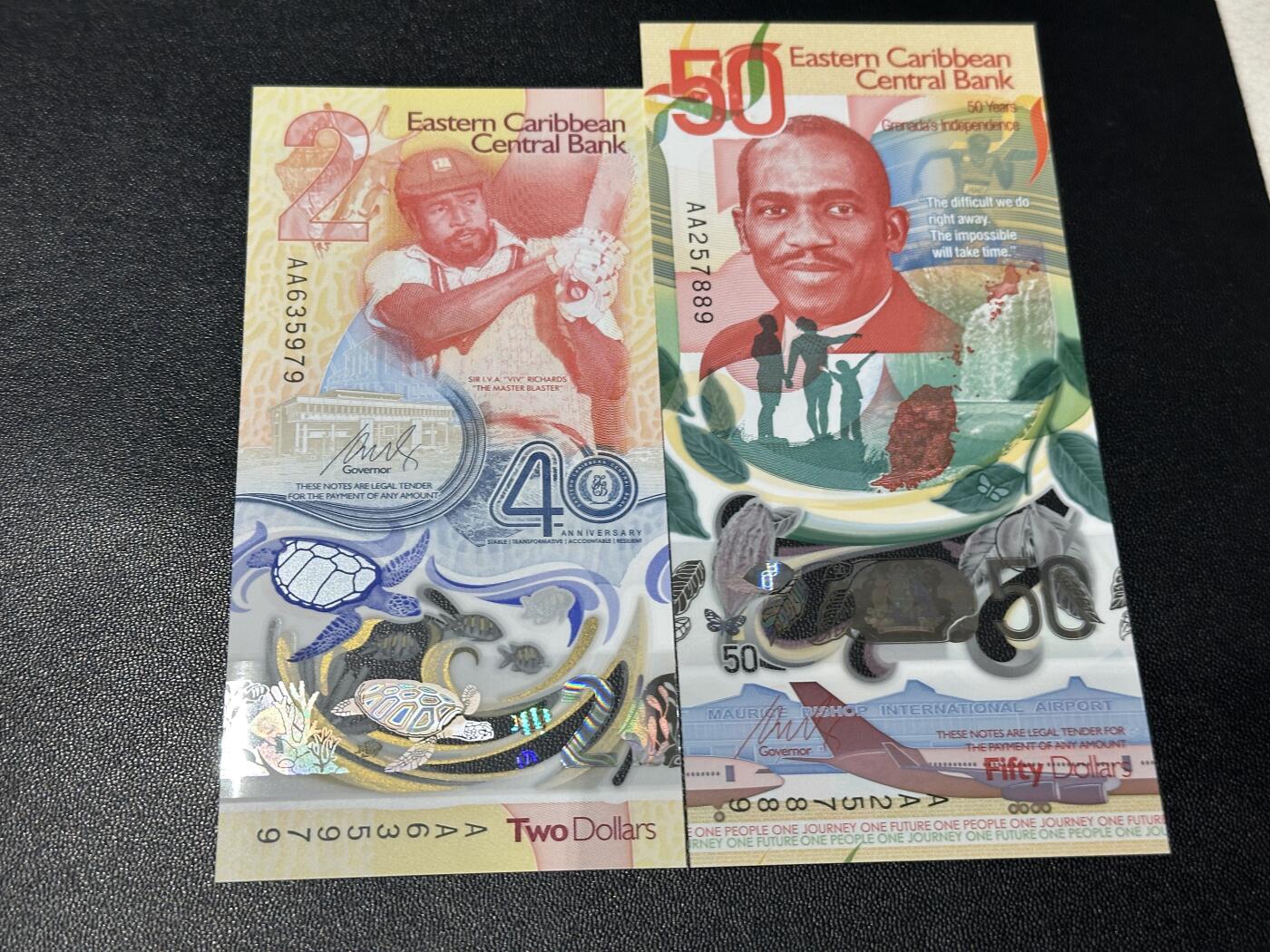 《外钞收藏家》第五百九十期（欧洲强钞、港币、硬通货及丰富裸币大拍场）（本平台长期征集拍品、欢迎藏友们联系合作） 东加勒比40和50面额 2张纪念钞一起 全新UNC 全部是靓号尾9