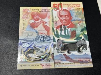 《外钞收藏家》第五百九十期（欧洲强钞、港币、硬通货及丰富裸币大拍场）（本平台长期征集拍品、欢迎藏友们联系合作） - 东加勒比40和50面额 2张纪念钞一起 全新UNC 全部是靓号尾9