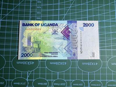 【炜奕收藏】，第五十二期 - 2010年乌干达2000先令，UNC品相，AA冠千位倒置号