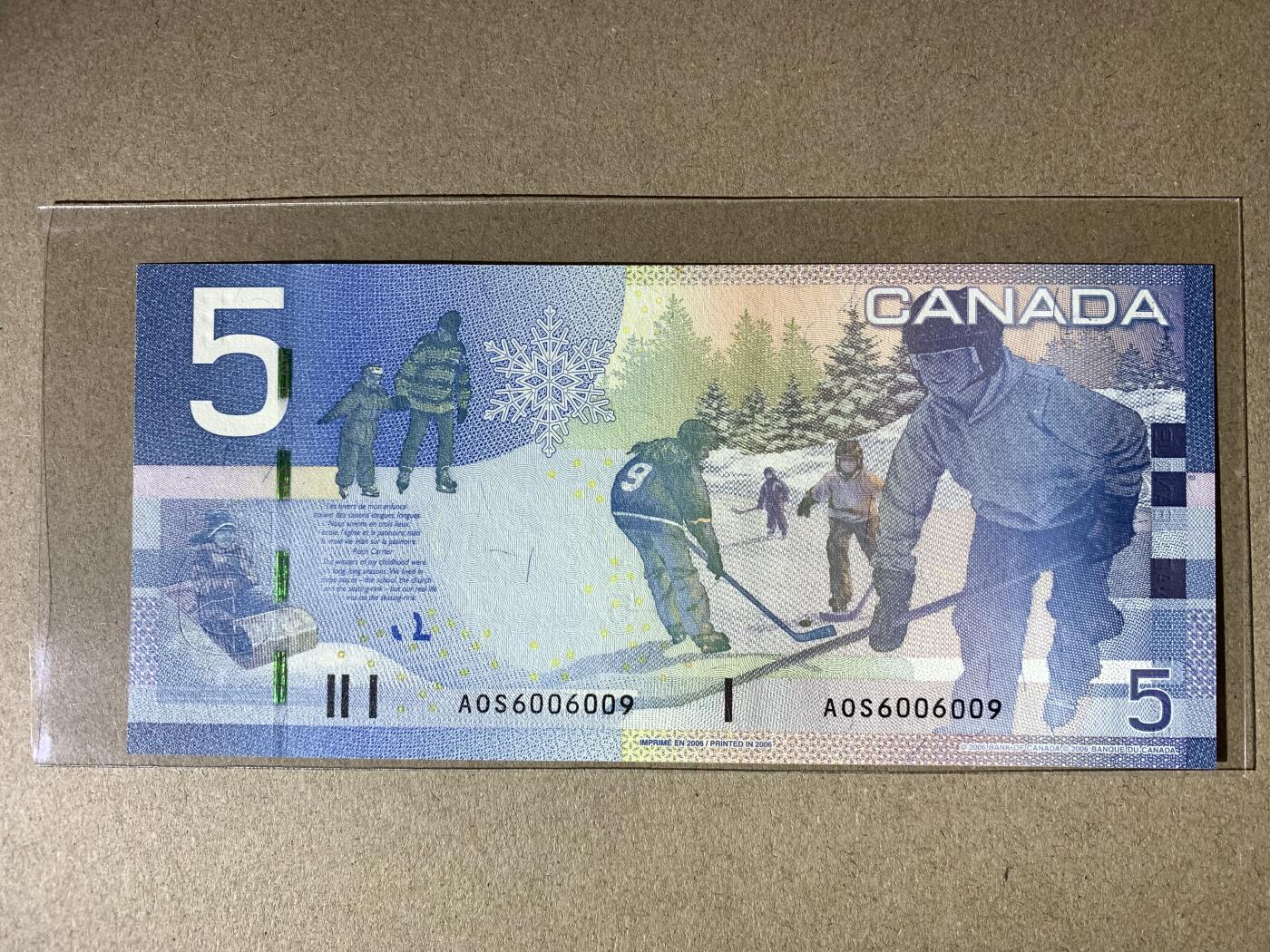 【礼羽收藏】🌏世界钱币拍卖第114期 【AOS6006009】全新UNC 2006年加拿大旅版5加元纸币 无3457尾6009  圆圆倒置号 数三069组合