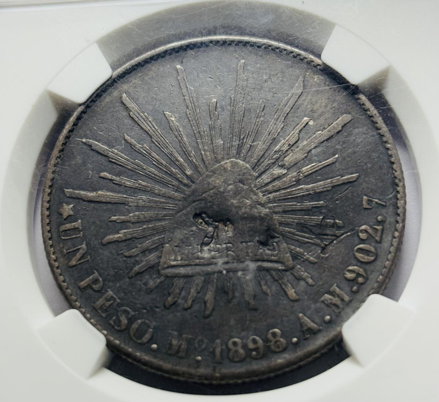 文馨钱币收藏第 283 场，【大雪鉴珍，寒英缀金】金银纪念币精品场，诚邀您的参与【长期接代拍品】 1898 年墨西哥鹰洋银元 NGC 评级，有加盖戳记，也说明了当时货币交易流通频繁的历史荣光