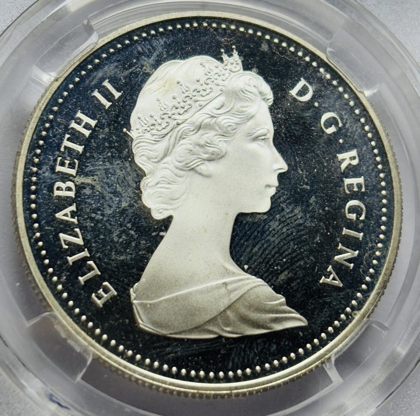 文馨钱币收藏第 283 场，【大雪鉴珍，寒英缀金】金银纪念币精品场，诚邀您的参与【长期接代拍品】 1983 年加拿大艾蒙顿大学运动会一元大银币，MS70 分