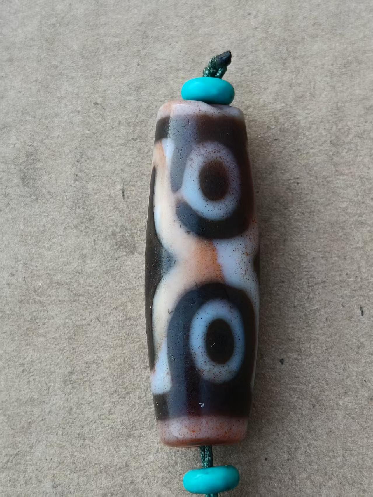 藏传四眼硃砂天珠