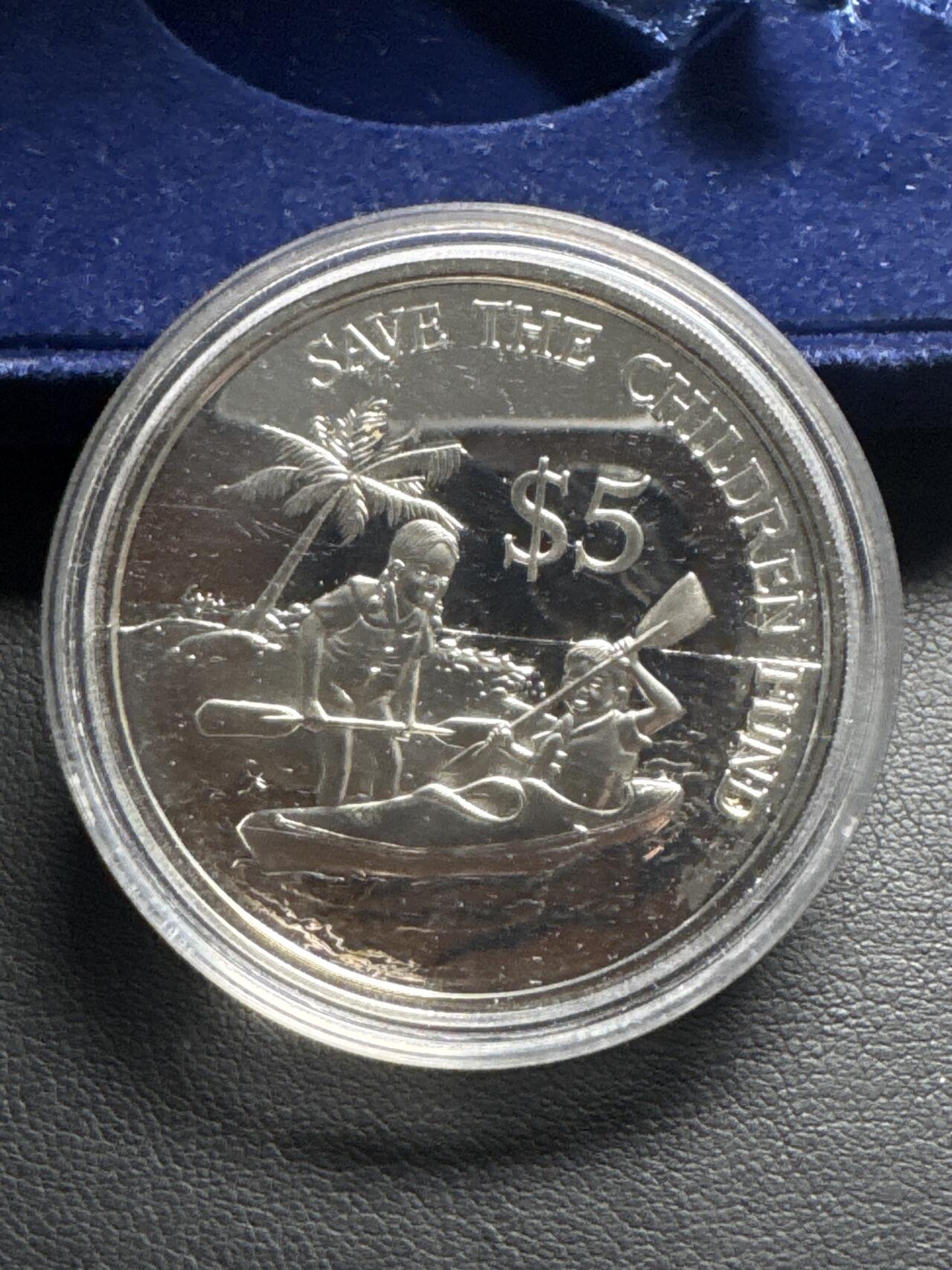 ❤️【币观天下】❤️ 第333期钱币拍卖- 2025.12.5周五晚上6点半场-长期征集拍品 新加坡1989年联合国拯救儿童基金会成立70周年精制纪念银币盒证齐全