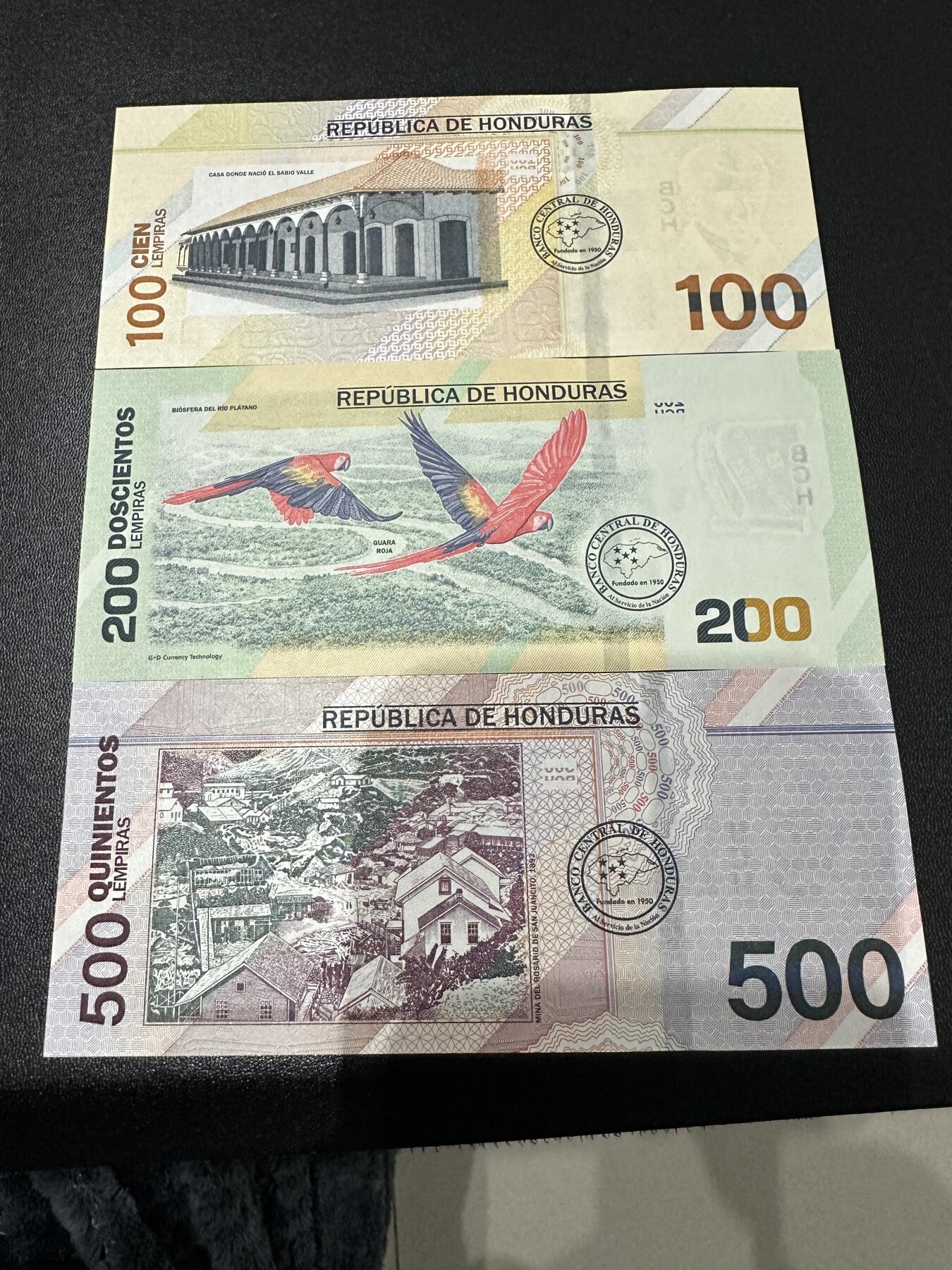 《外钞收藏家》第五百九十期（欧洲强钞、港币、硬通货及丰富裸币大拍场）（本平台长期征集拍品、欢迎藏友们联系合作） 洪都拉斯100、200、500面额 三张一起 全新UNC 尾9