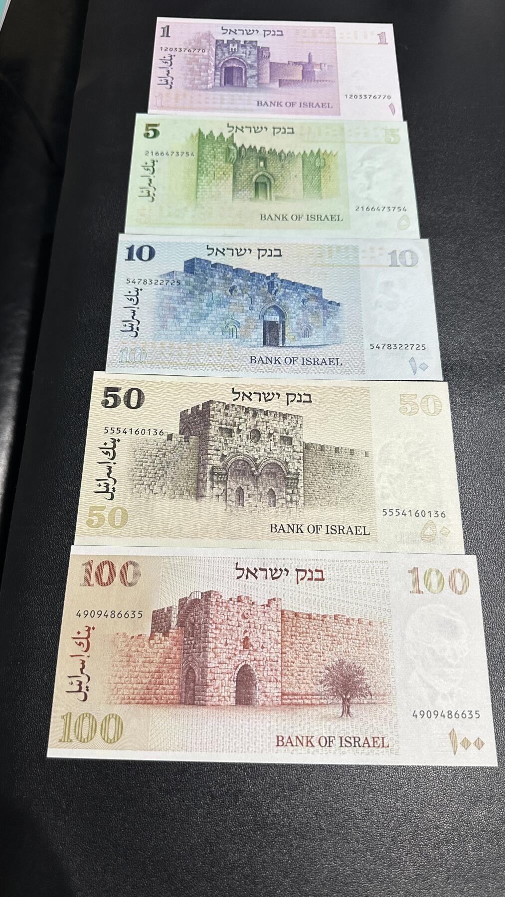 《外钞收藏家》第五百九十期（欧洲强钞、港币、硬通货及丰富裸币大拍场）（本平台长期征集拍品、欢迎藏友们联系合作） 1978、79年以色列1-100谢克尔 五张一起 全新UNC 有2个边上轻微荧光反应