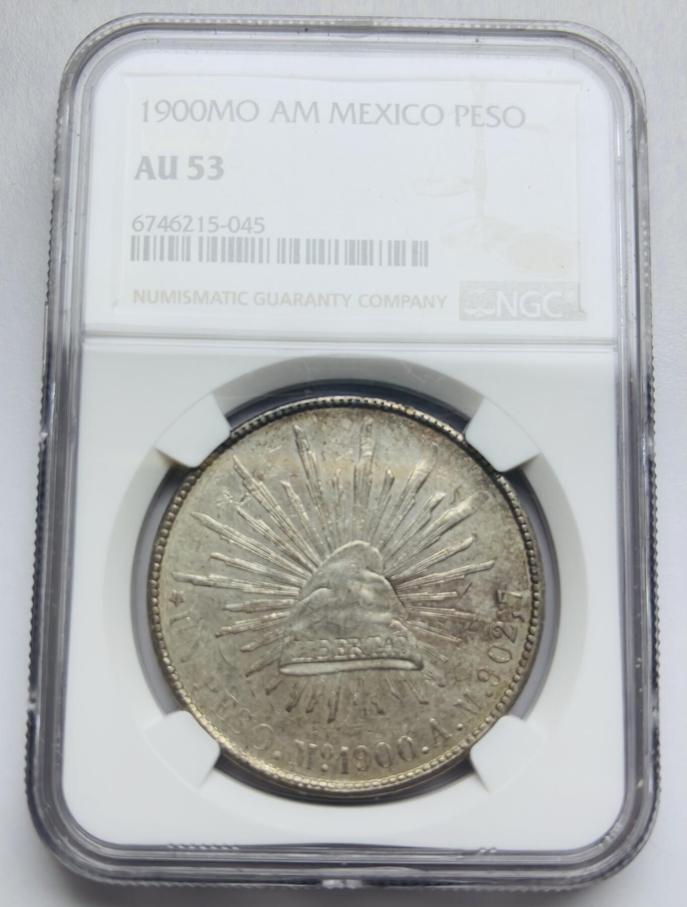 文馨钱币收藏第 283 场，【大雪鉴珍，寒英缀金】金银纪念币精品场，诚邀您的参与【长期接代拍品】 1900 年墨西哥鹰洋 1 比索大银元 NGC 评级 AU53 分，酱彩包浆