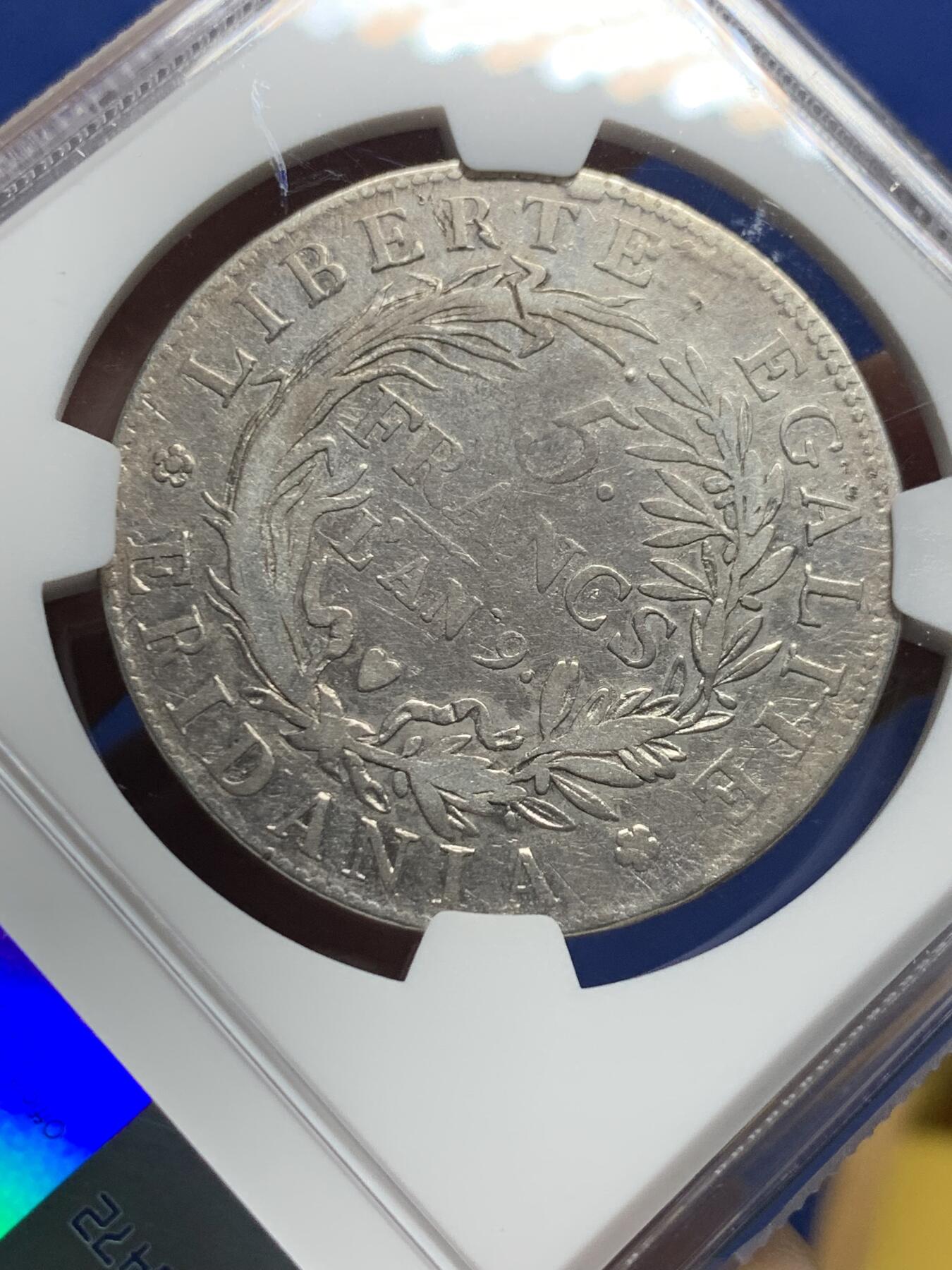 《竞宝斋》第444场 周日，周一，2场连拍 （全场包邮） NGC FD 意大利皮埃蒙特共和国（阿尔卑斯共和国） 共和9年（1800年）5法郎银币 拿破仑1799年在北意大利建立的国家 细节不错 感觉可以冲VF 这枚只发行两个年份 1800铸造量仅46740枚 发行量几乎是1801年的1/3不到 稀缺品种