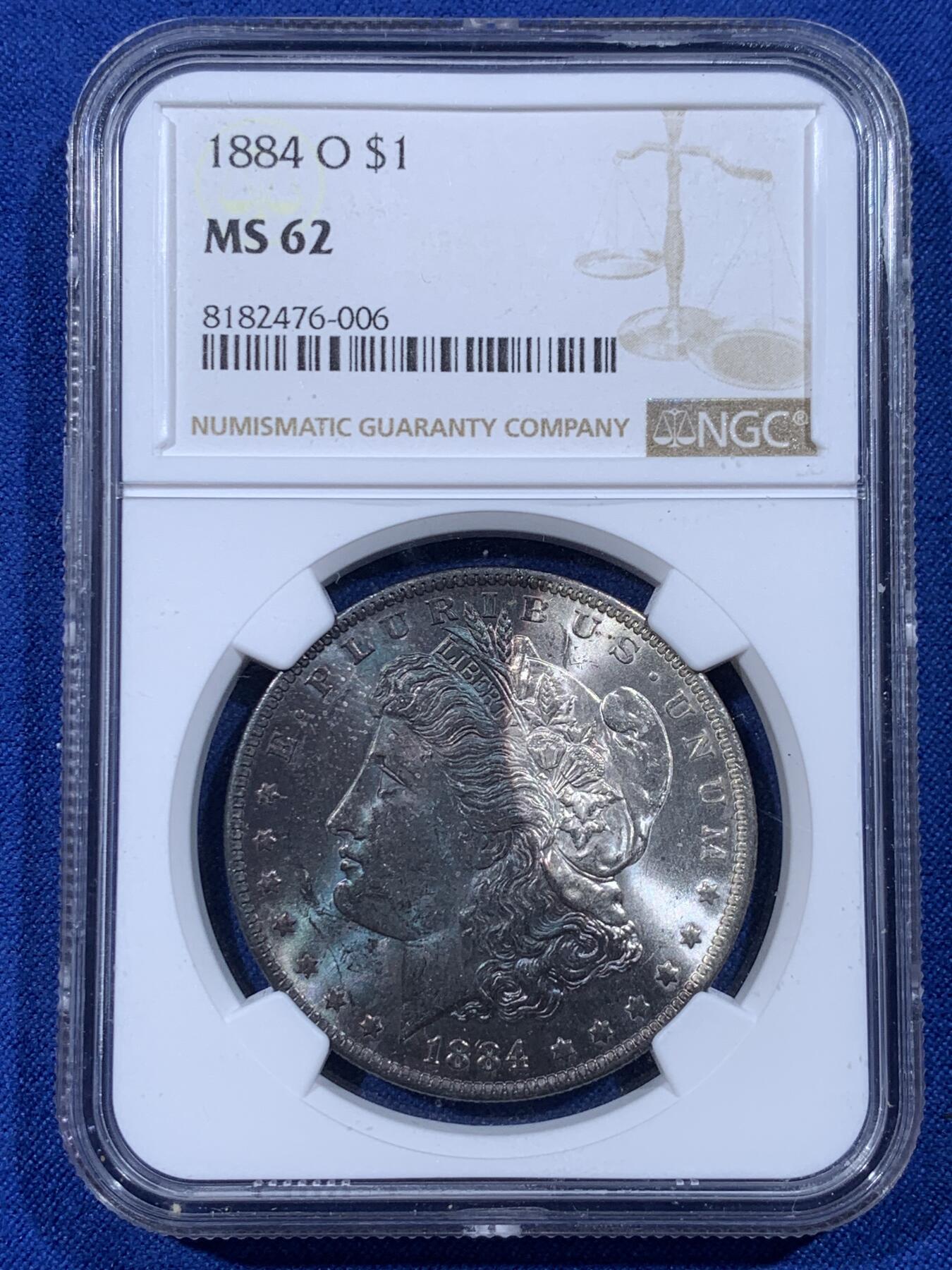 《竞宝斋》第444场 周日，周一，2场连拍 （全场包邮） NGC MS62 美国1884年摩根银币O版，原汁原味深蓝彩老包浆，极美大月牙彩，包浆醇厚润泽，状态极佳，低评。